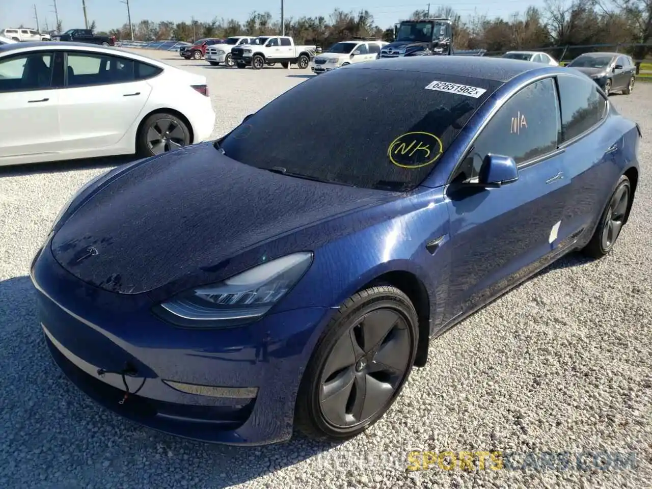 2 Photograph of a damaged car 5YJ3E1EC4LF586599 TESLA MODEL 3 2020