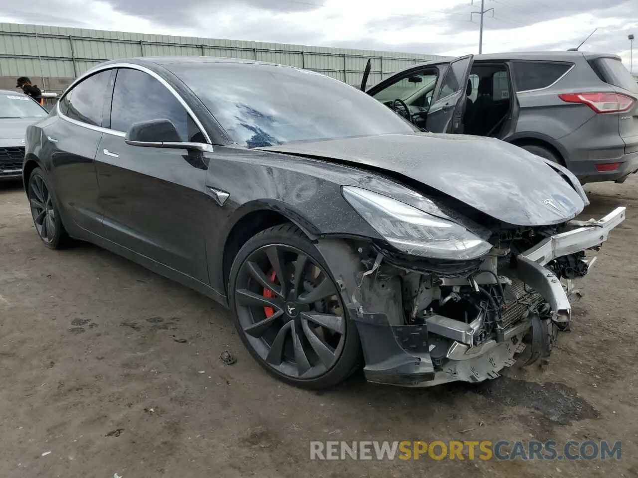 4 Photograph of a damaged car 5YJ3E1EC4LF669224 TESLA MODEL 3 2020