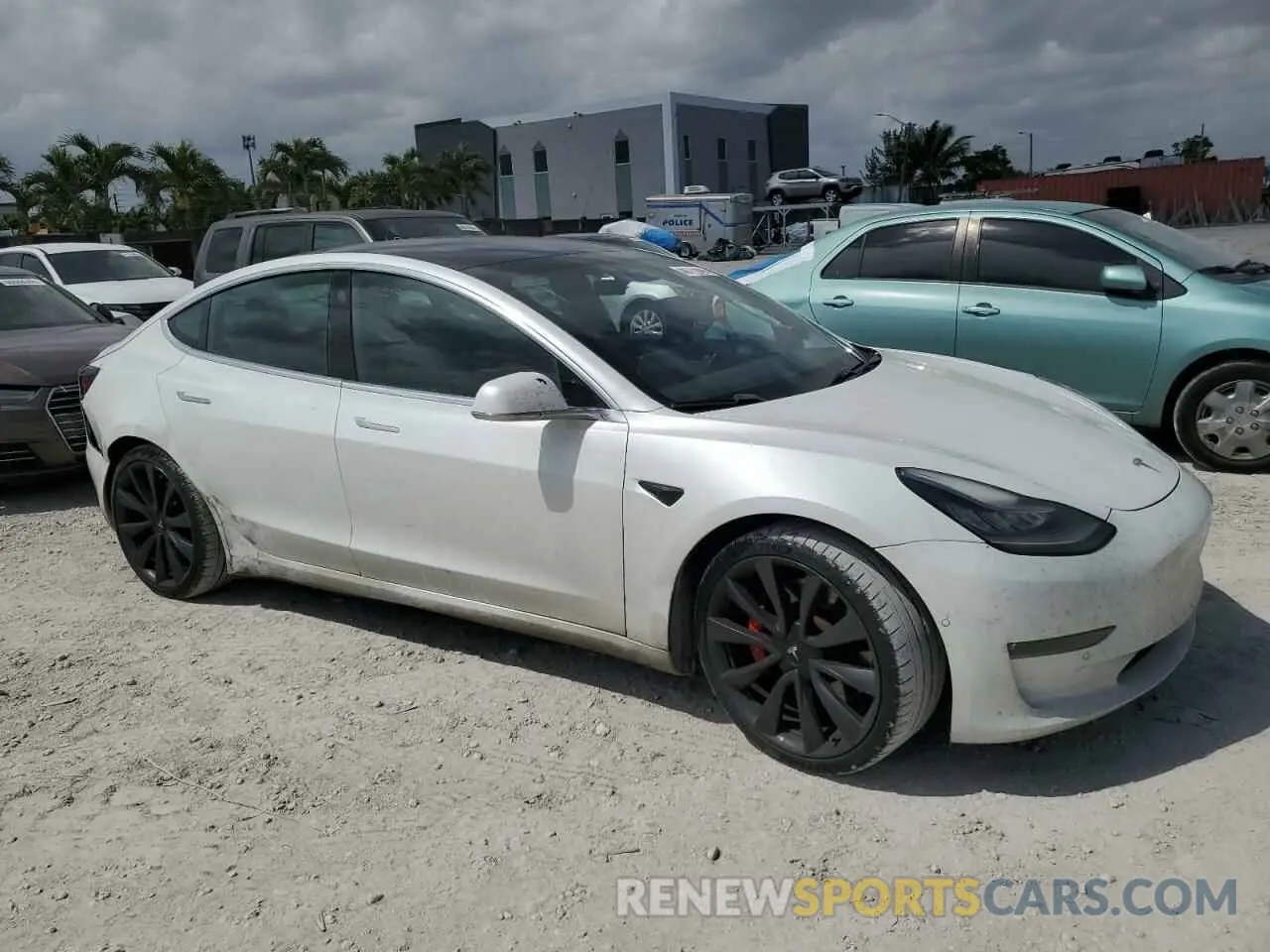 4 Photograph of a damaged car 5YJ3E1EC4LF800149 TESLA MODEL 3 2020