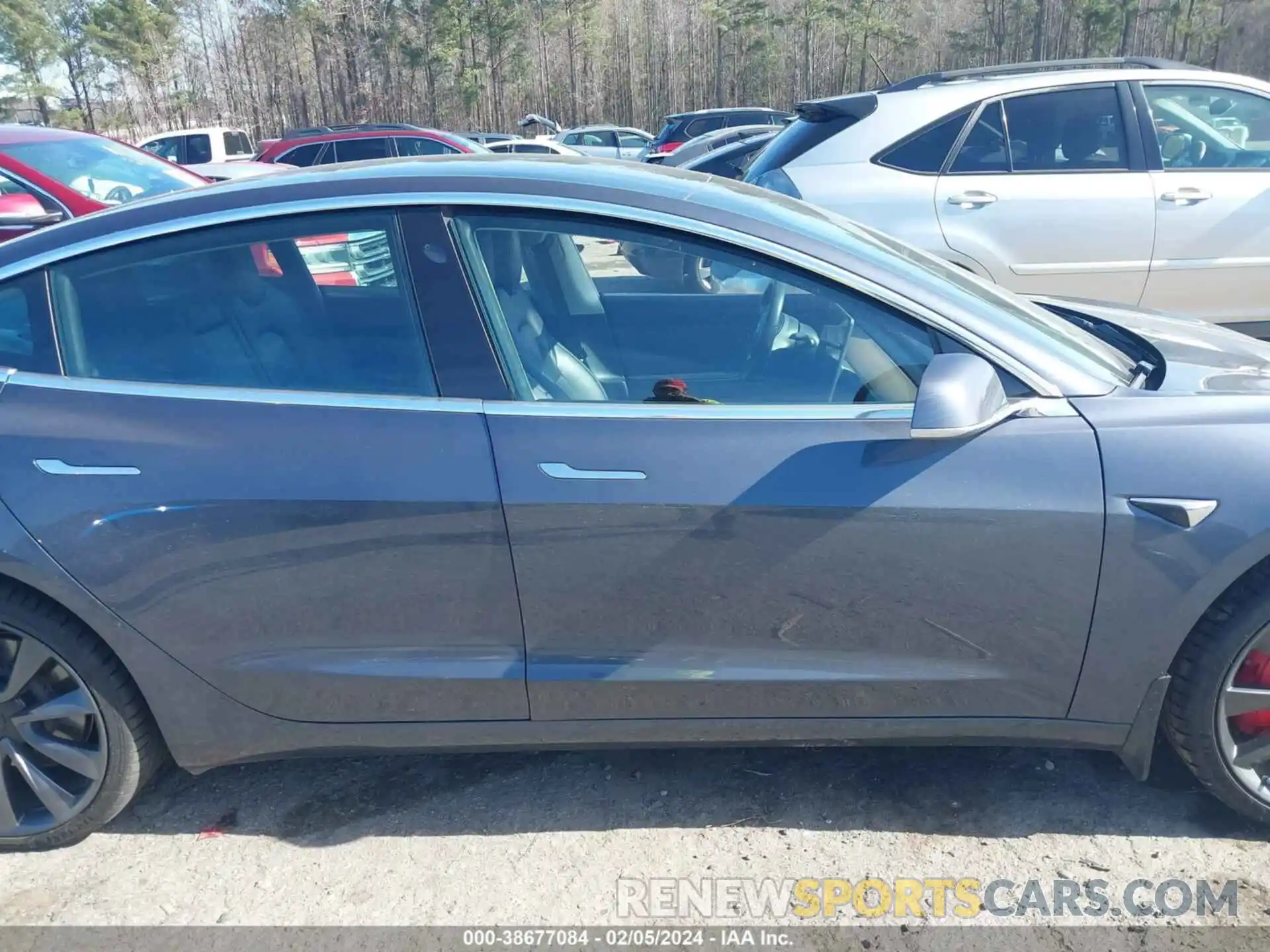 12 Photograph of a damaged car 5YJ3E1EC6LF646902 TESLA MODEL 3 2020