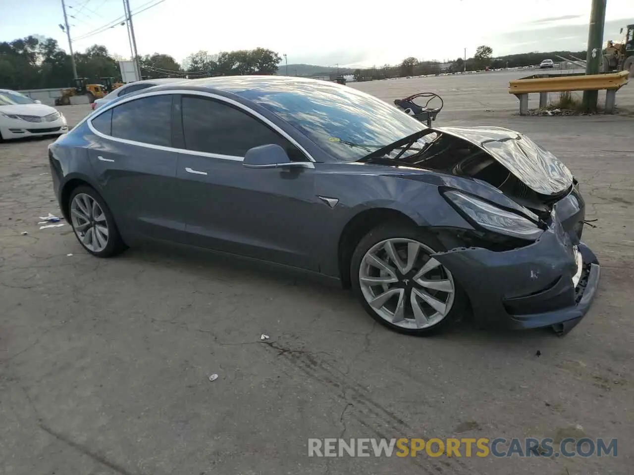 4 Photograph of a damaged car 5YJ3E1EC7LF627243 TESLA MODEL 3 2020