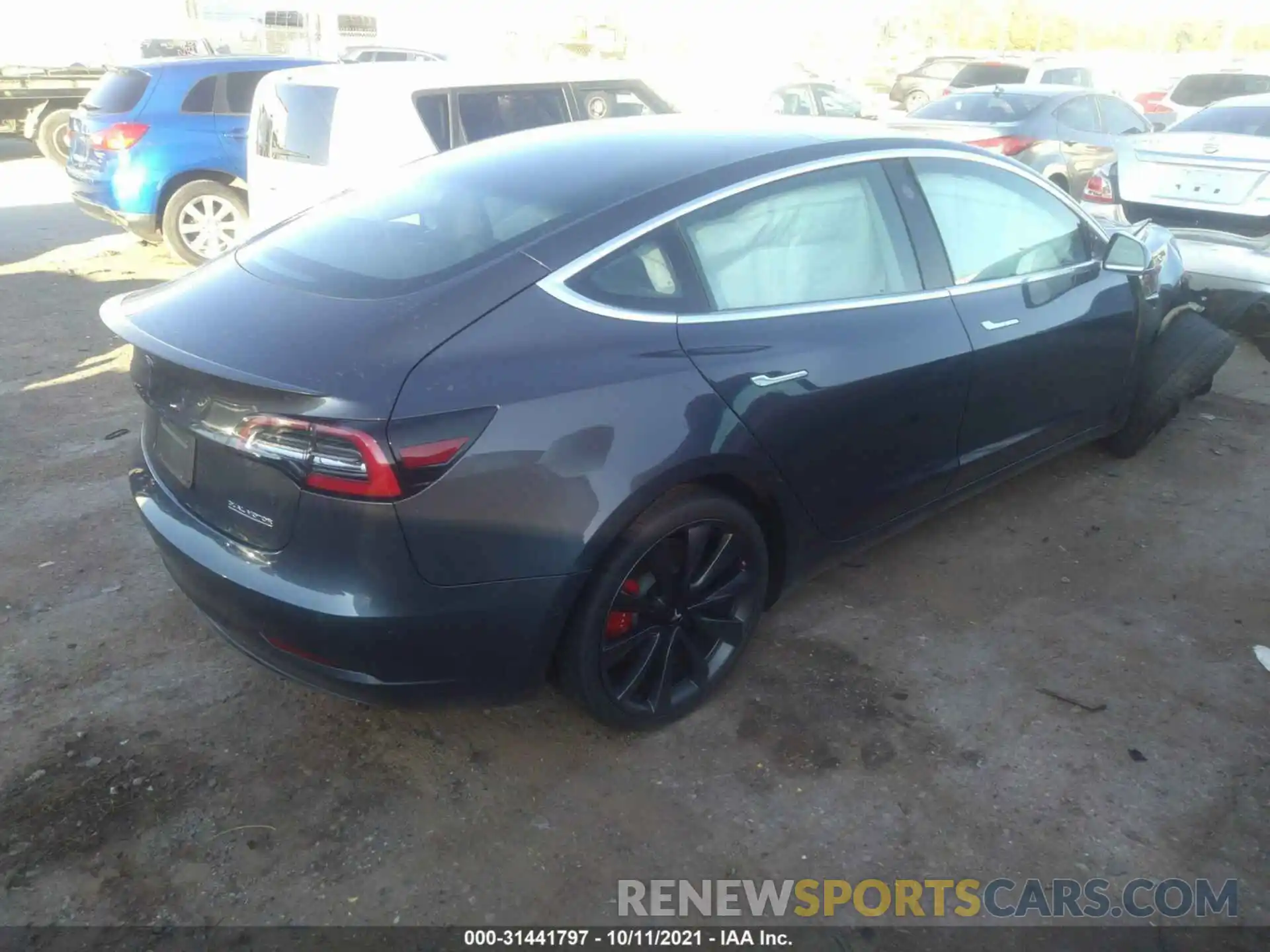 4 Photograph of a damaged car 5YJ3E1EC7LF646911 TESLA MODEL 3 2020