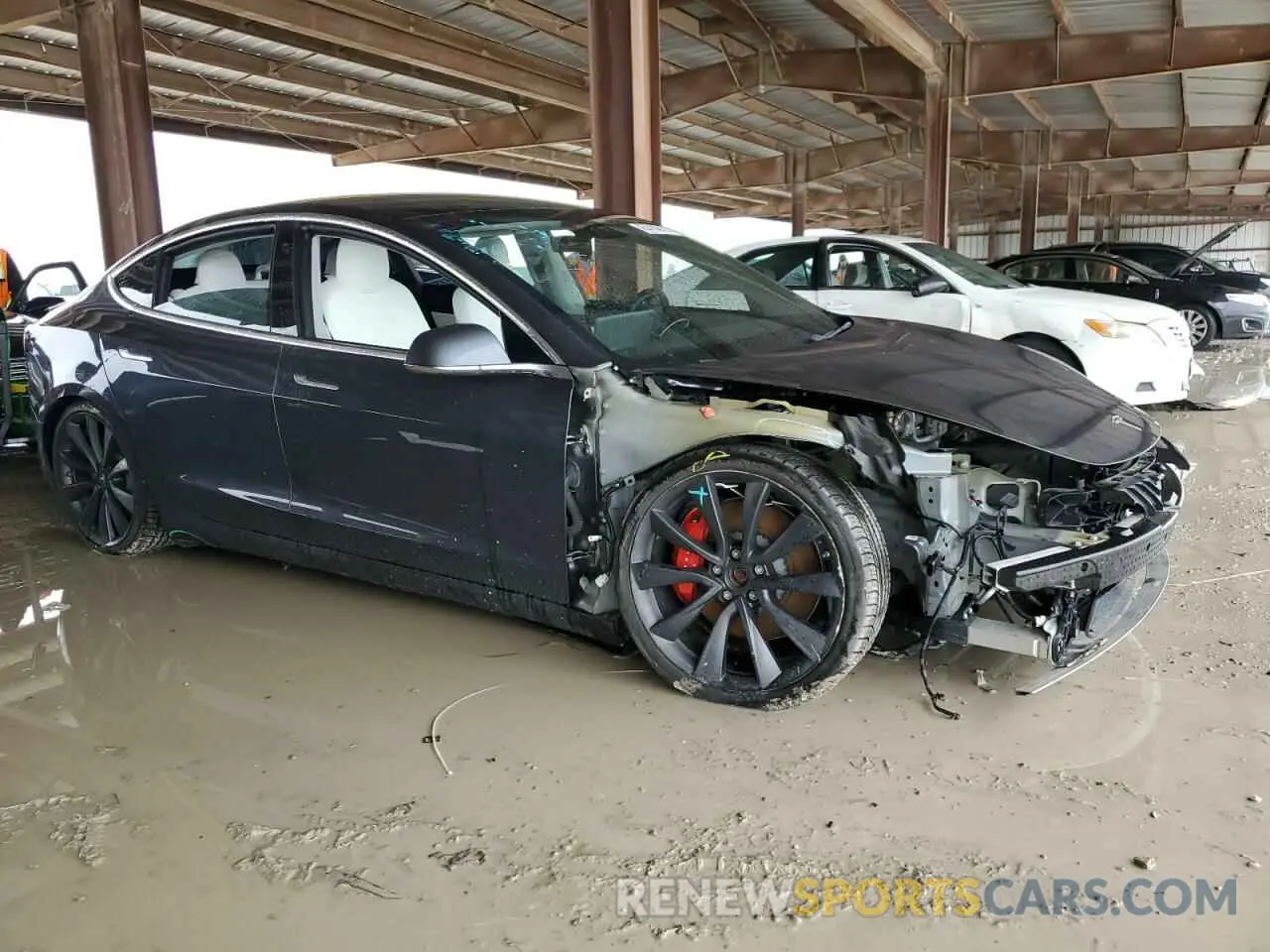 4 Photograph of a damaged car 5YJ3E1EC7LF714625 TESLA MODEL 3 2020