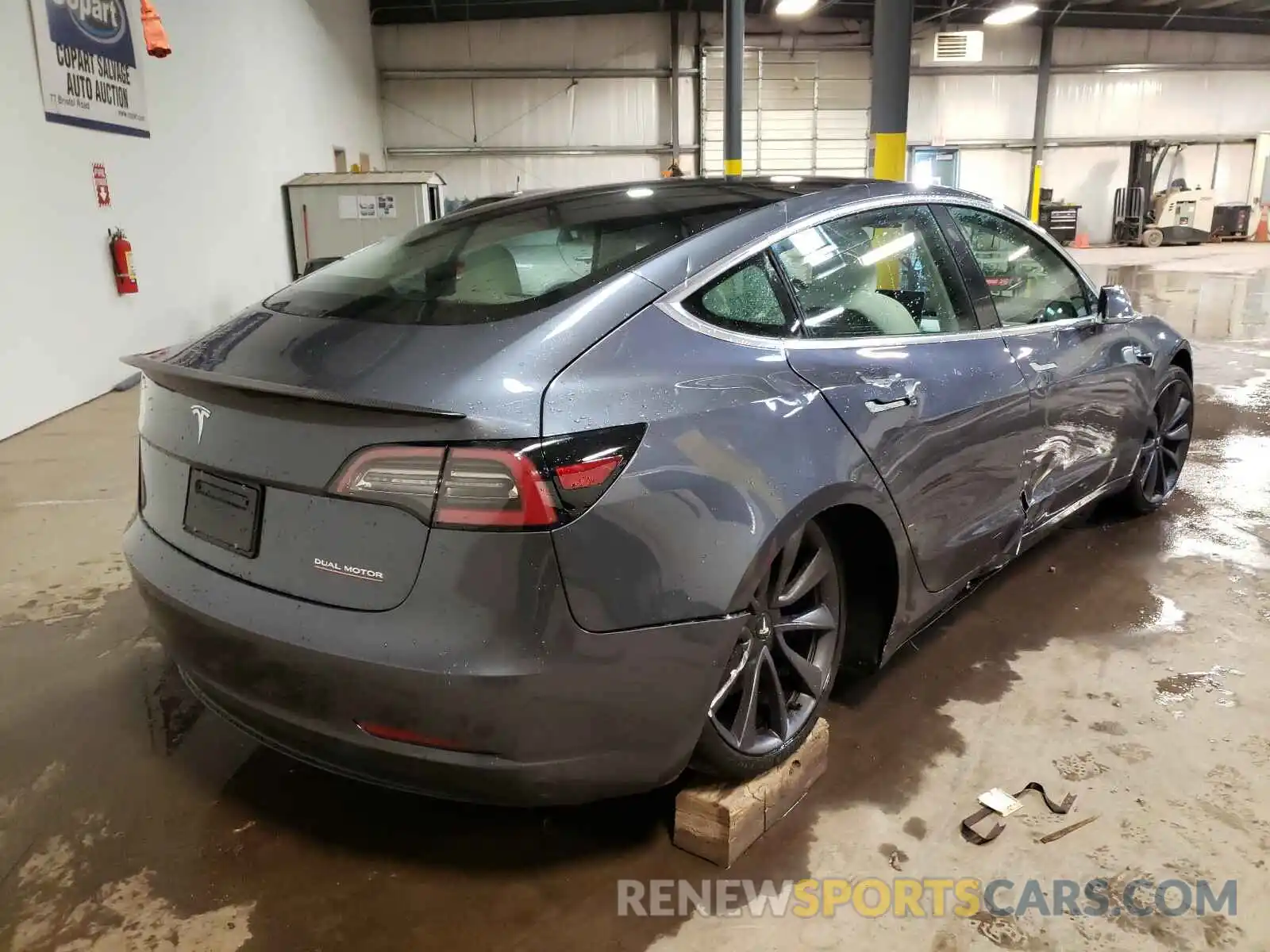 4 Photograph of a damaged car 5YJ3E1EC7LF783413 TESLA MODEL 3 2020