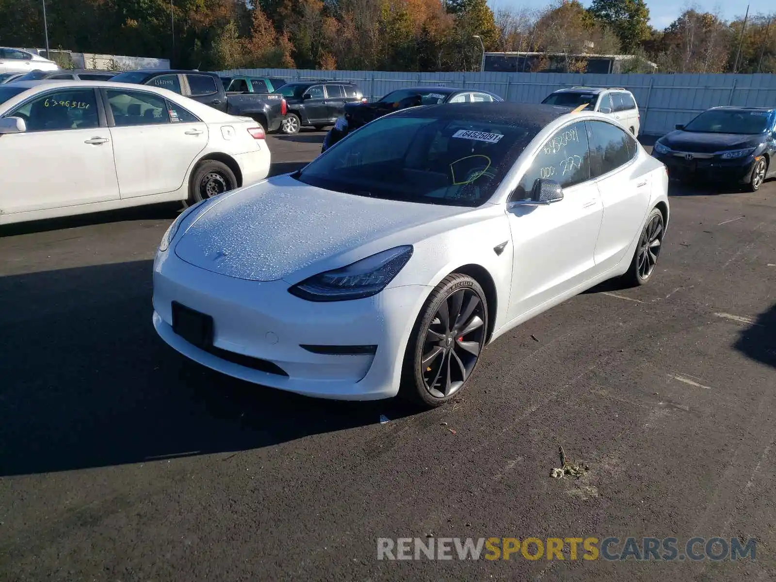 2 Photograph of a damaged car 5YJ3E1EC8LF641393 TESLA MODEL 3 2020