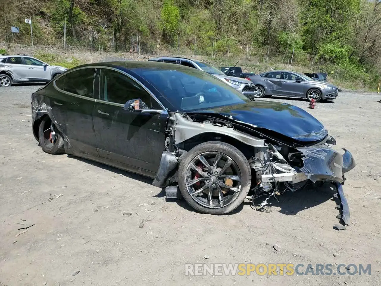 4 Photograph of a damaged car 5YJ3E1EC8LF746838 TESLA MODEL 3 2020