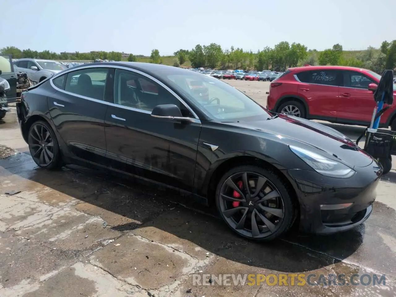 4 Photograph of a damaged car 5YJ3E1EC9LF713119 TESLA MODEL 3 2020