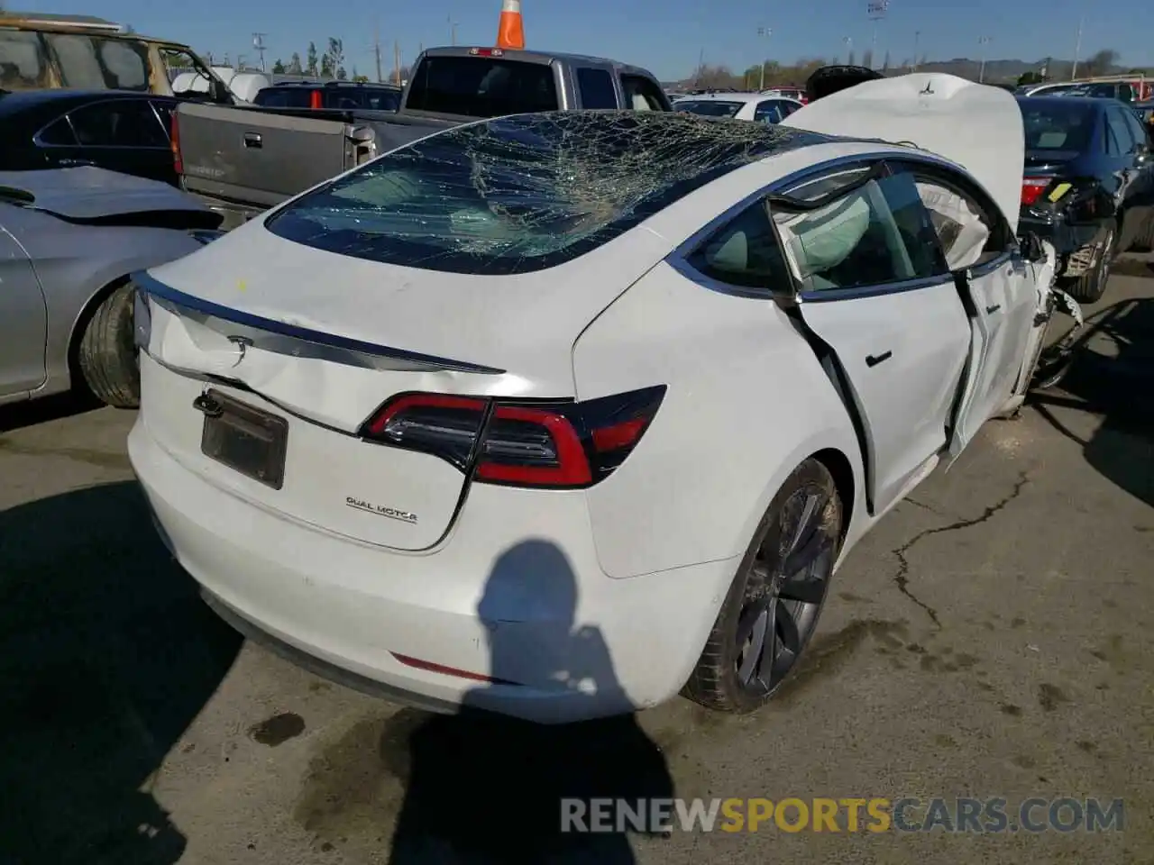 4 Photograph of a damaged car 5YJ3E1EC9LF719454 TESLA MODEL 3 2020