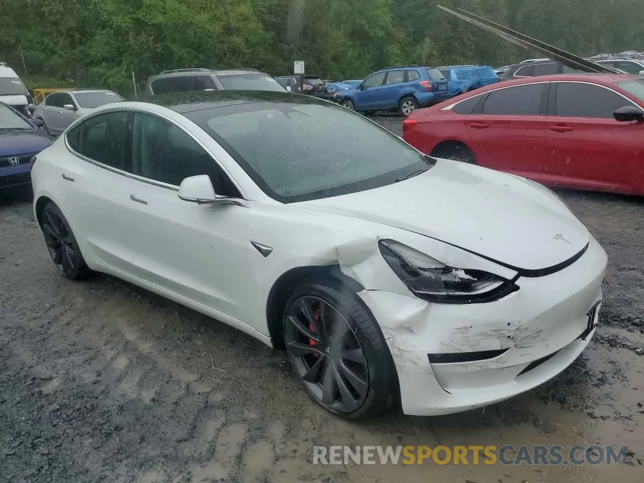 4 Photograph of a damaged car 5YJ3E1EC9LF784594 TESLA MODEL 3 2020