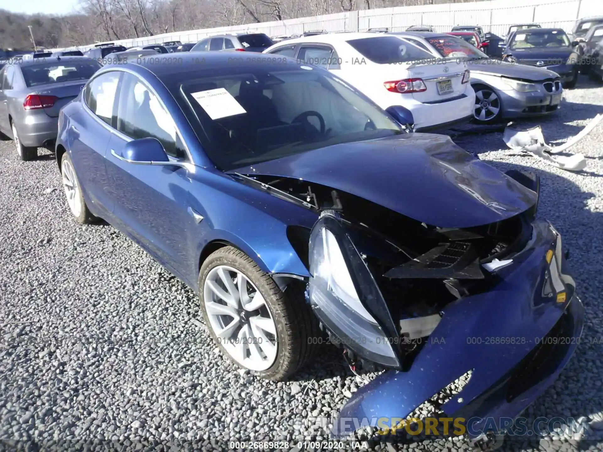 1 Photograph of a damaged car 5YJ3E1ECXLF586882 TESLA MODEL 3 2020