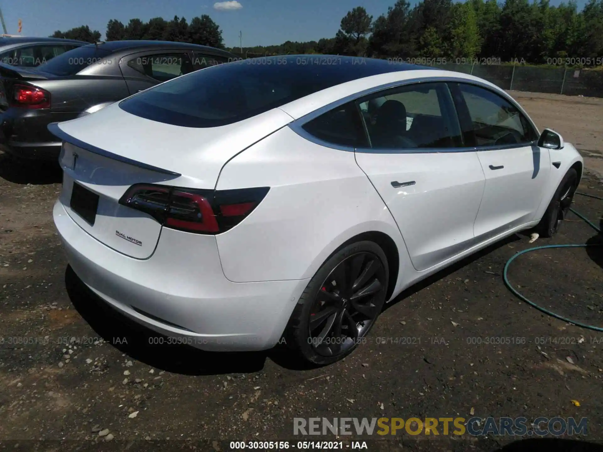 4 Photograph of a damaged car 5YJ3E1ECXLF623963 TESLA MODEL 3 2020