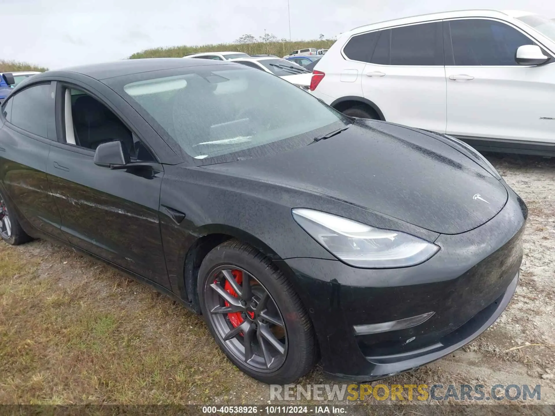 1 Photograph of a damaged car 5YJ3E1EA0MF077805 TESLA MODEL 3 2021
