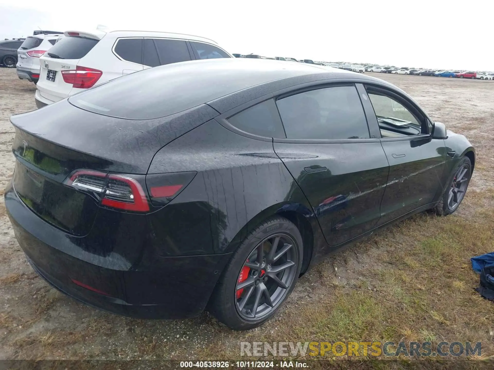 4 Photograph of a damaged car 5YJ3E1EA0MF077805 TESLA MODEL 3 2021