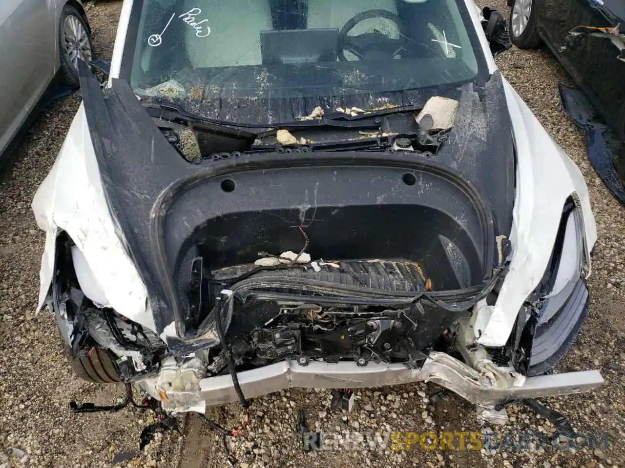 7 Photograph of a damaged car 5YJ3E1EA0MF082020 TESLA MODEL 3 2021