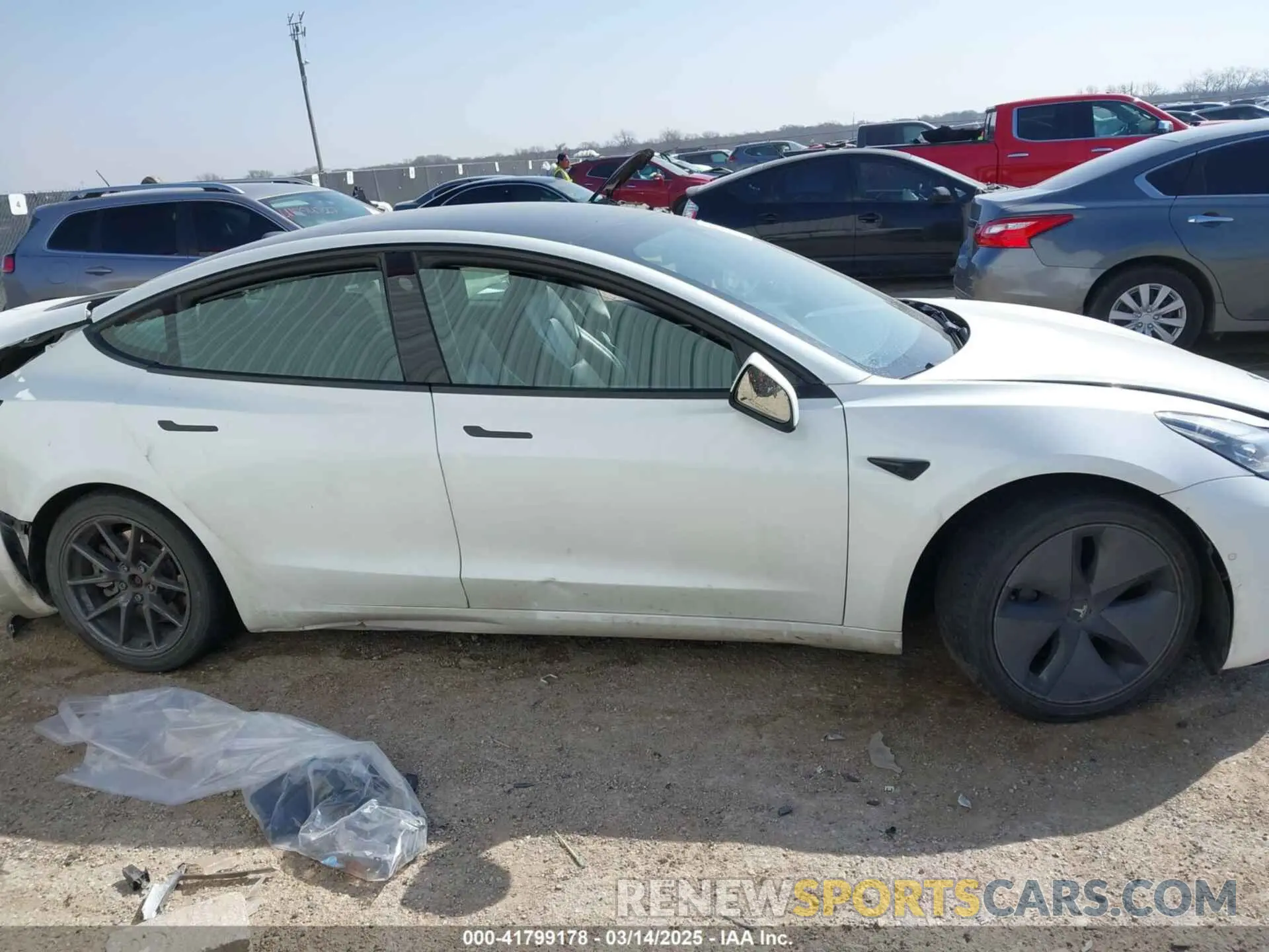 12 Photograph of a damaged car 5YJ3E1EA0MF095222 TESLA MODEL 3 2021
