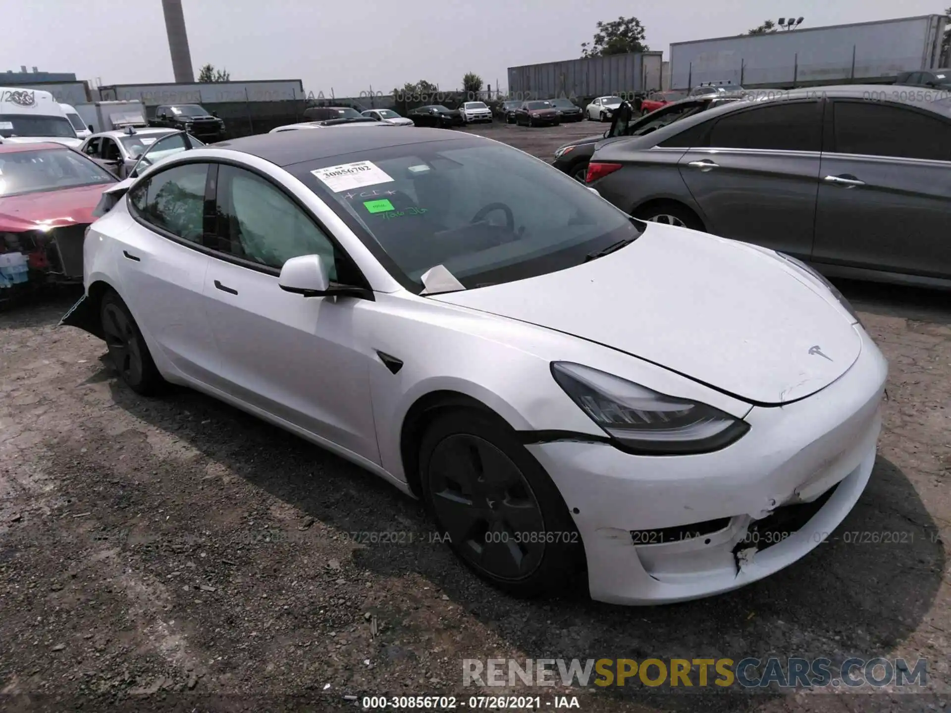 1 Photograph of a damaged car 5YJ3E1EA0MF838235 TESLA MODEL 3 2021