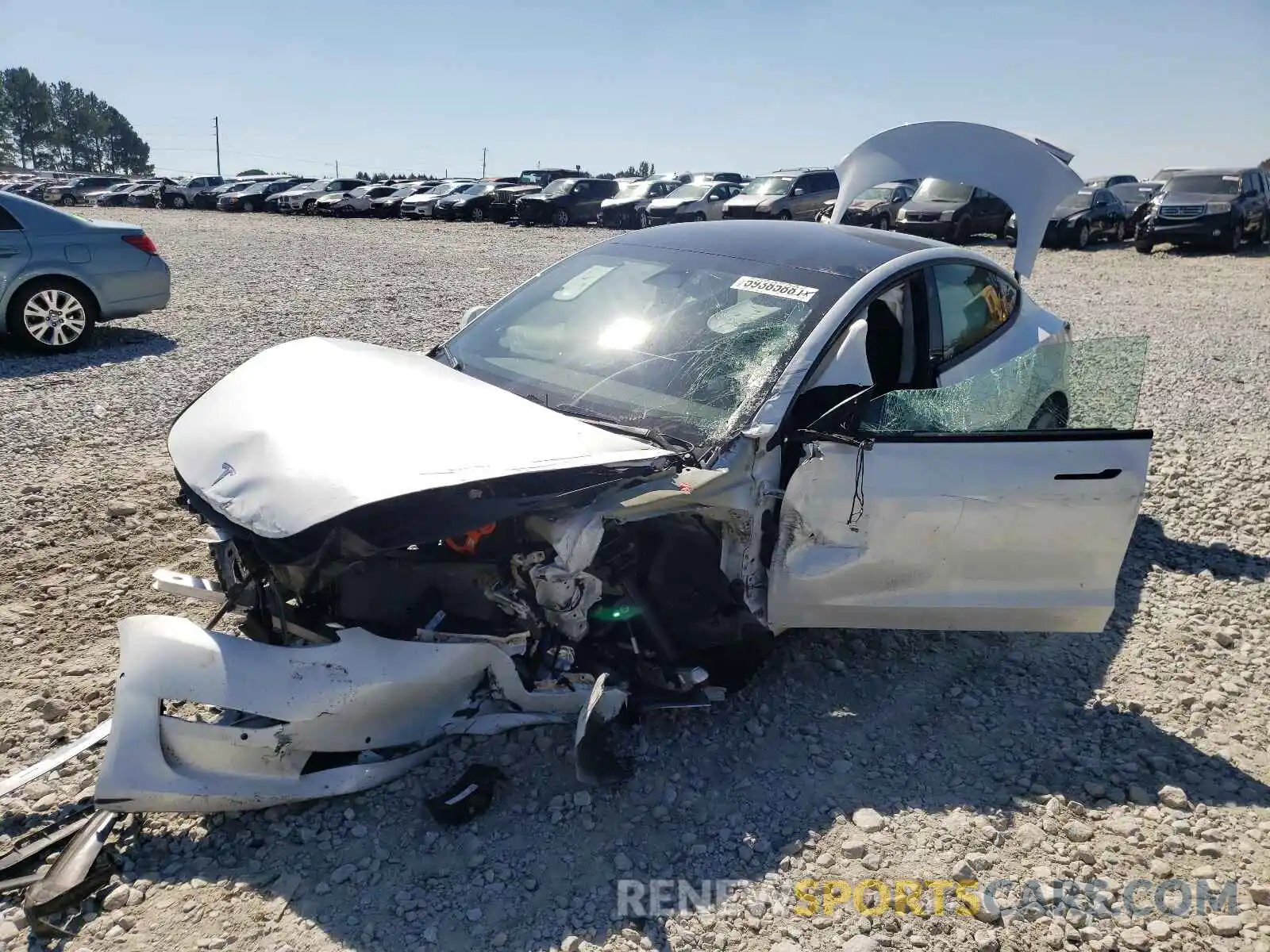 2 Photograph of a damaged car 5YJ3E1EA0MF852202 TESLA MODEL 3 2021