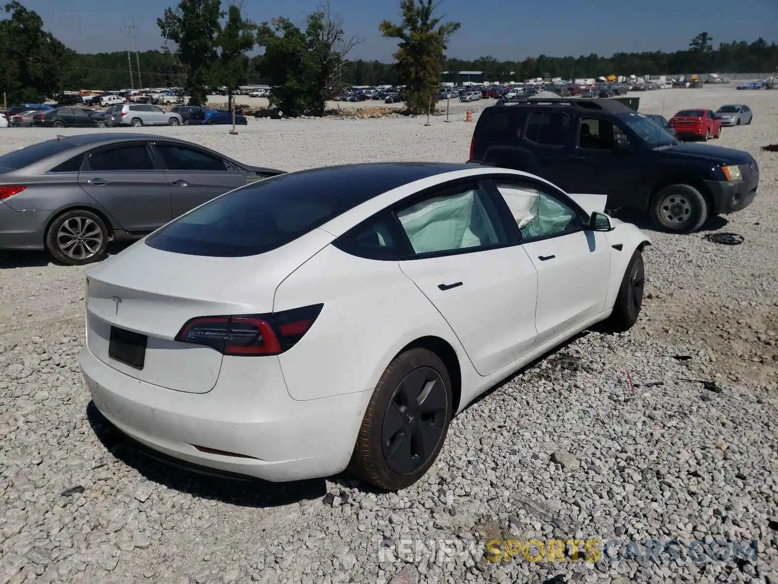 4 Photograph of a damaged car 5YJ3E1EA0MF852202 TESLA MODEL 3 2021