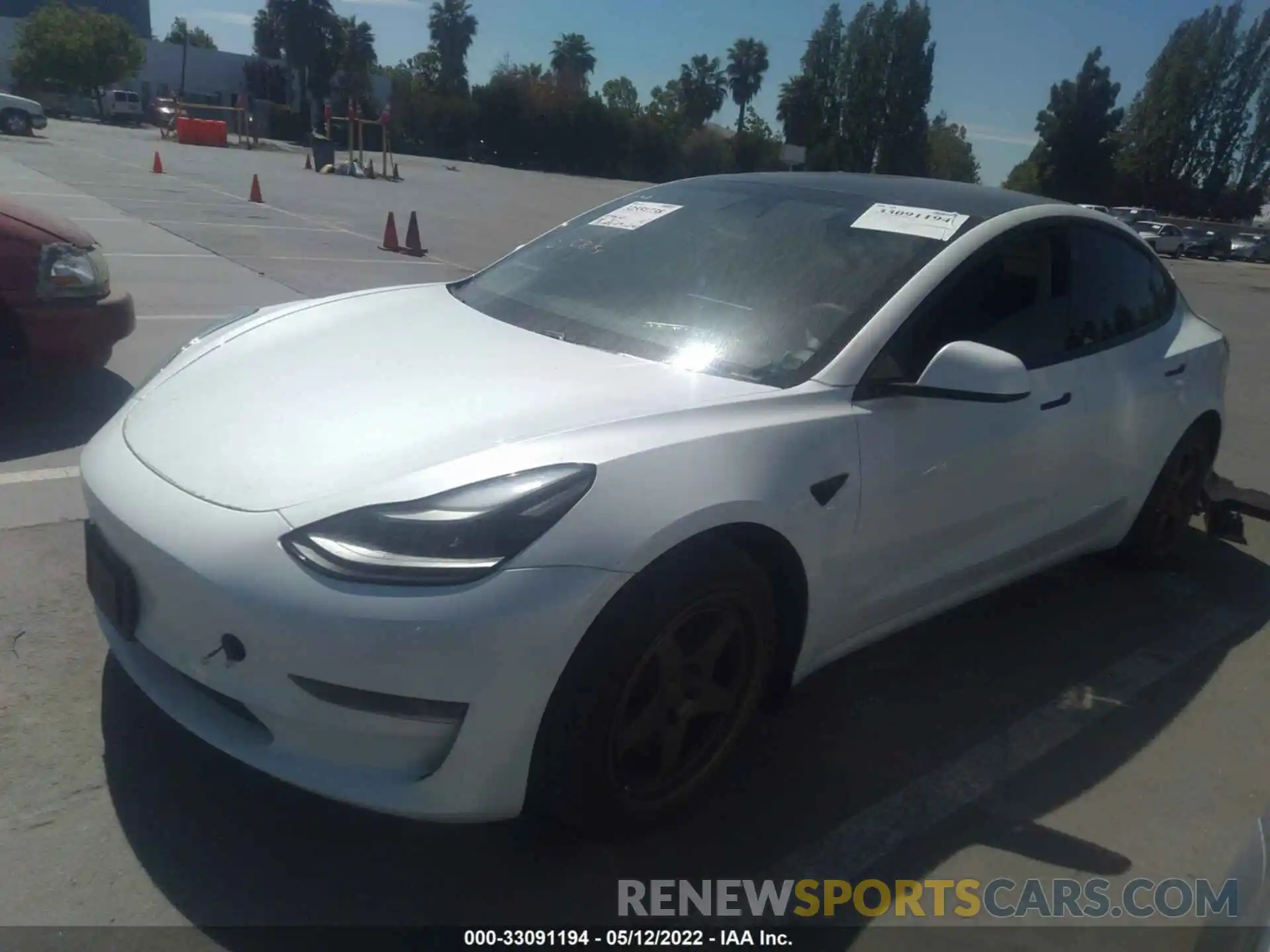 2 Photograph of a damaged car 5YJ3E1EA0MF874183 TESLA MODEL 3 2021