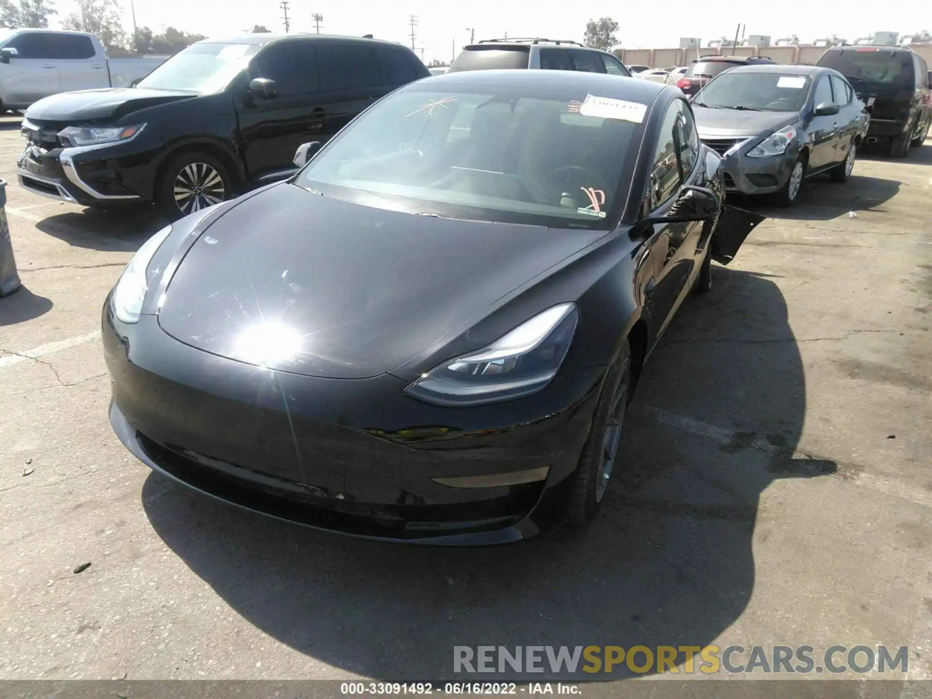 2 Photograph of a damaged car 5YJ3E1EA0MF876435 TESLA MODEL 3 2021