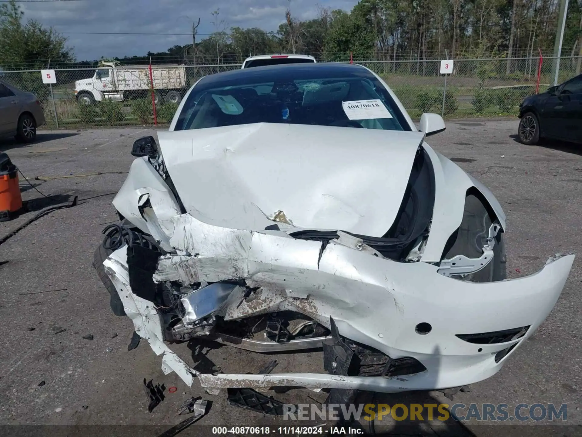 12 Photograph of a damaged car 5YJ3E1EA0MF907974 TESLA MODEL 3 2021