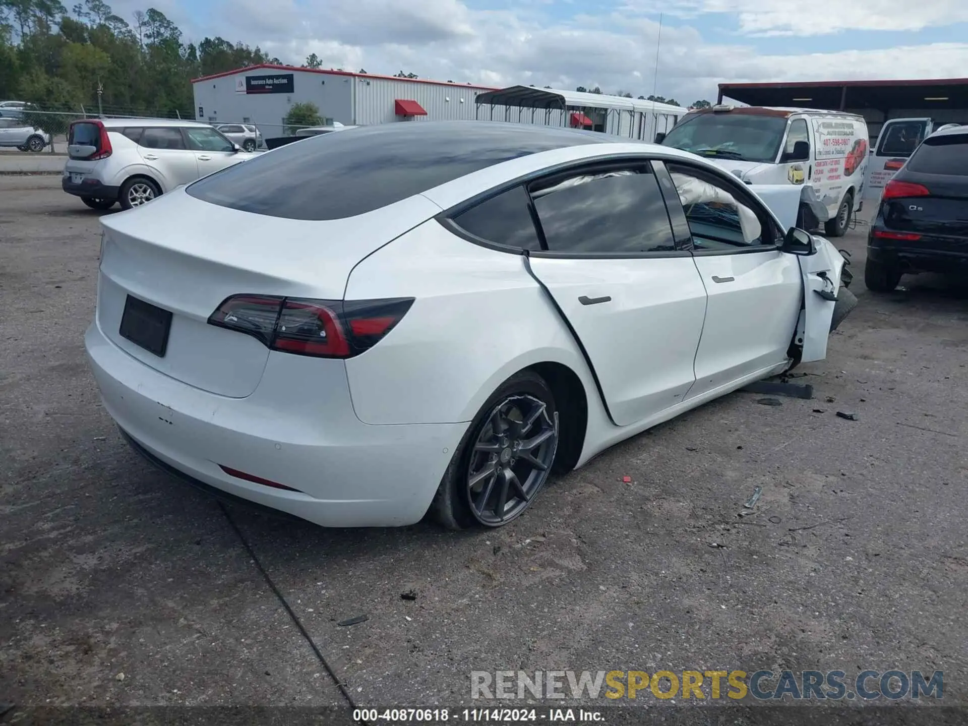 4 Photograph of a damaged car 5YJ3E1EA0MF907974 TESLA MODEL 3 2021