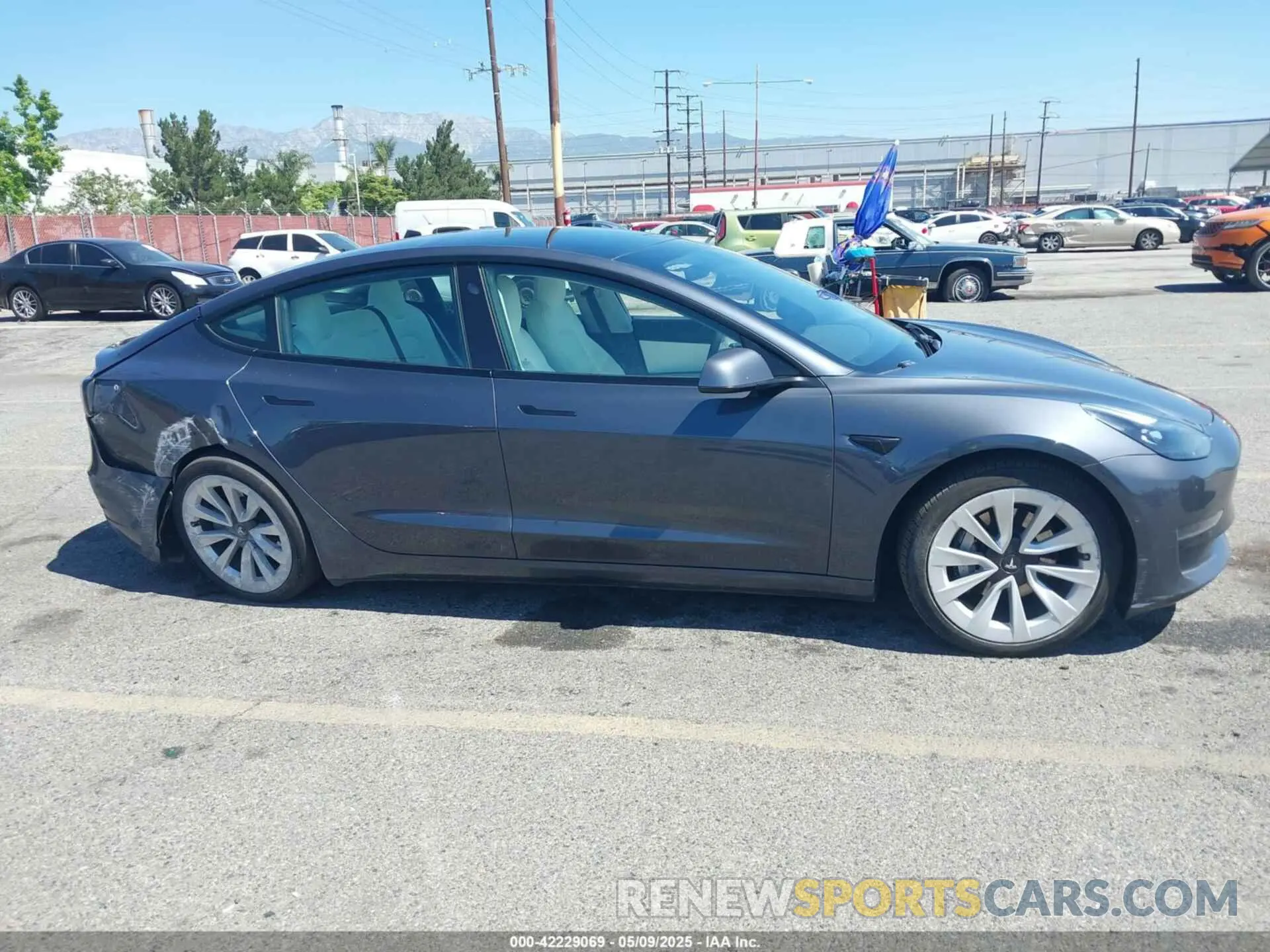 12 Photograph of a damaged car 5YJ3E1EA0MF908736 TESLA MODEL 3 2021
