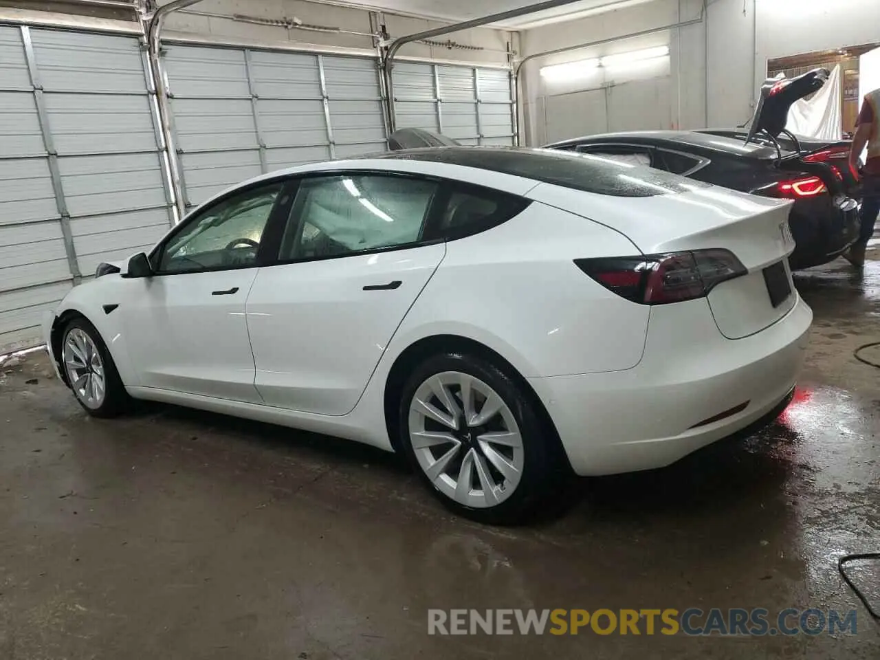 2 Photograph of a damaged car 5YJ3E1EA0MF913466 TESLA MODEL 3 2021