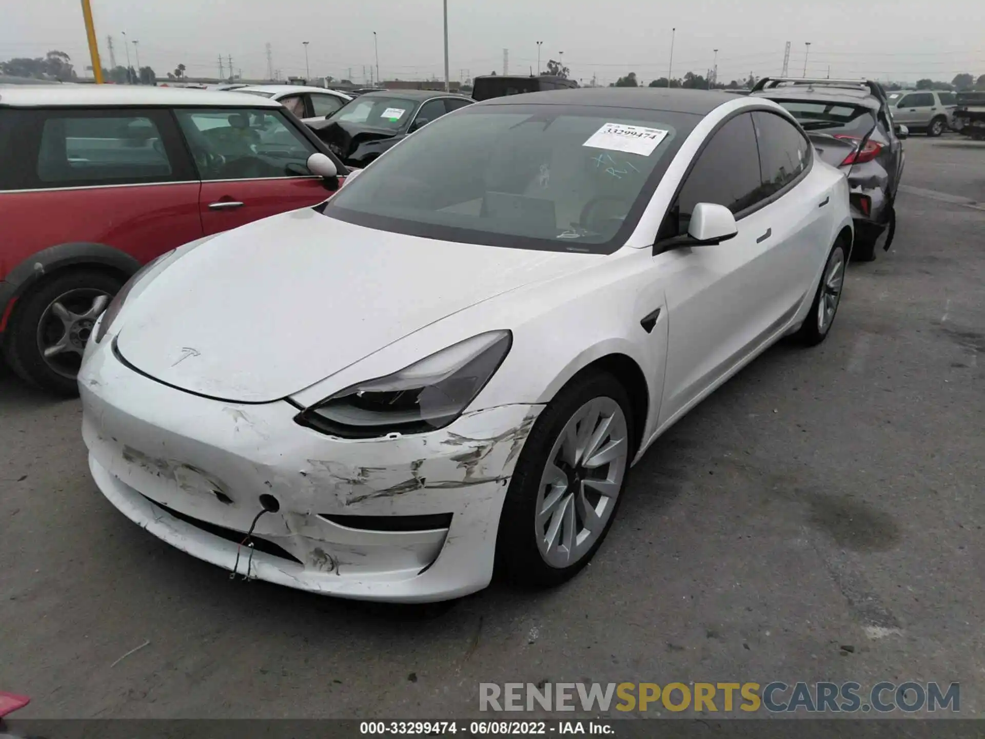 2 Photograph of a damaged car 5YJ3E1EA0MF927593 TESLA MODEL 3 2021