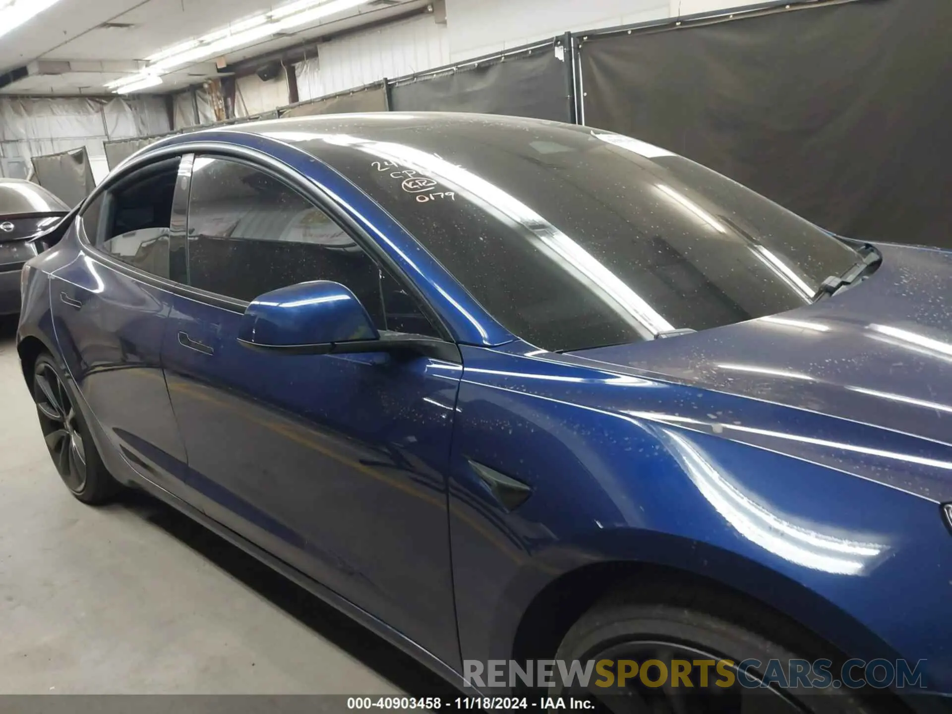 12 Photograph of a damaged car 5YJ3E1EA0MF940179 TESLA MODEL 3 2021