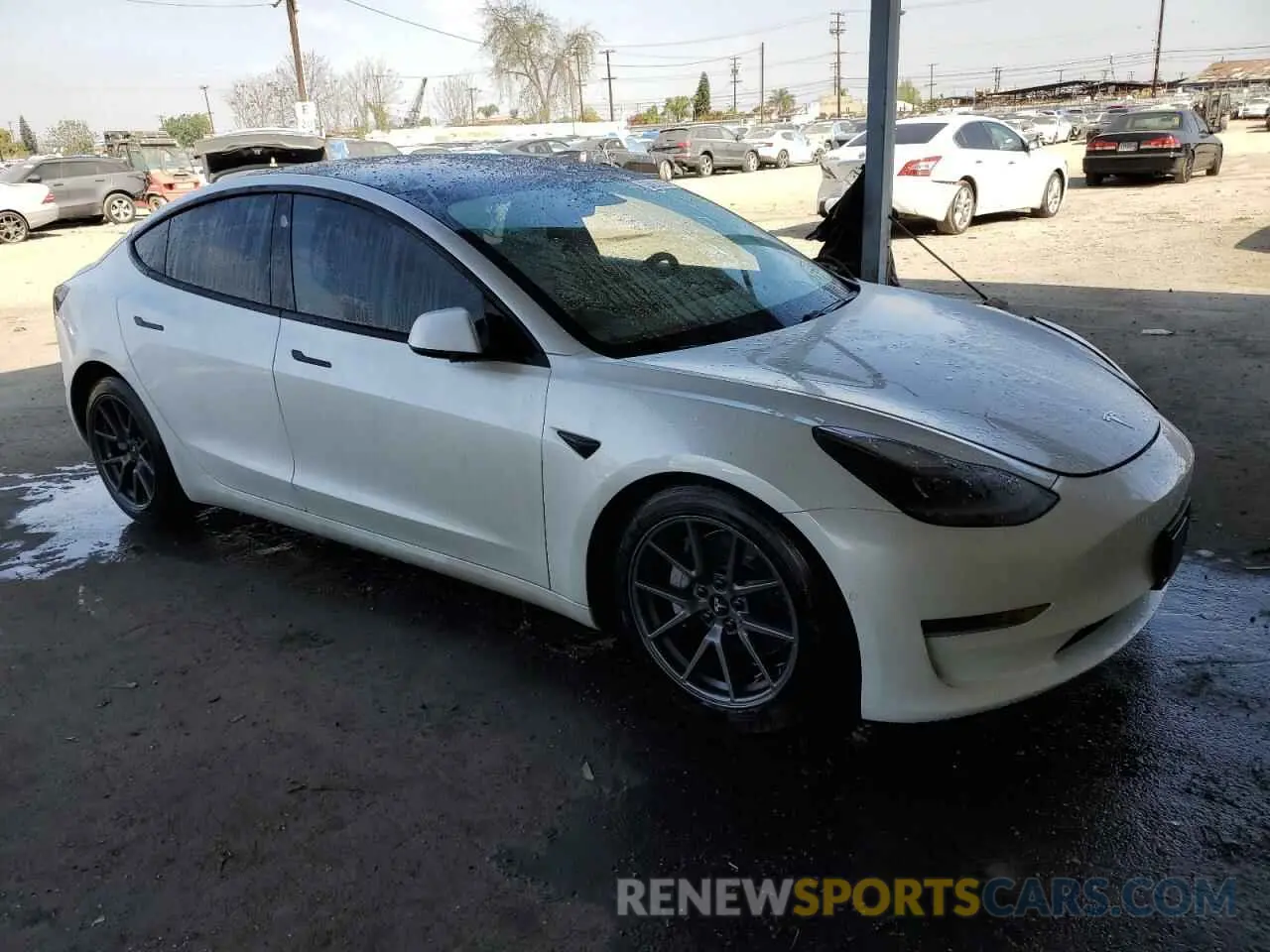 4 Photograph of a damaged car 5YJ3E1EA0MF940389 TESLA MODEL 3 2021
