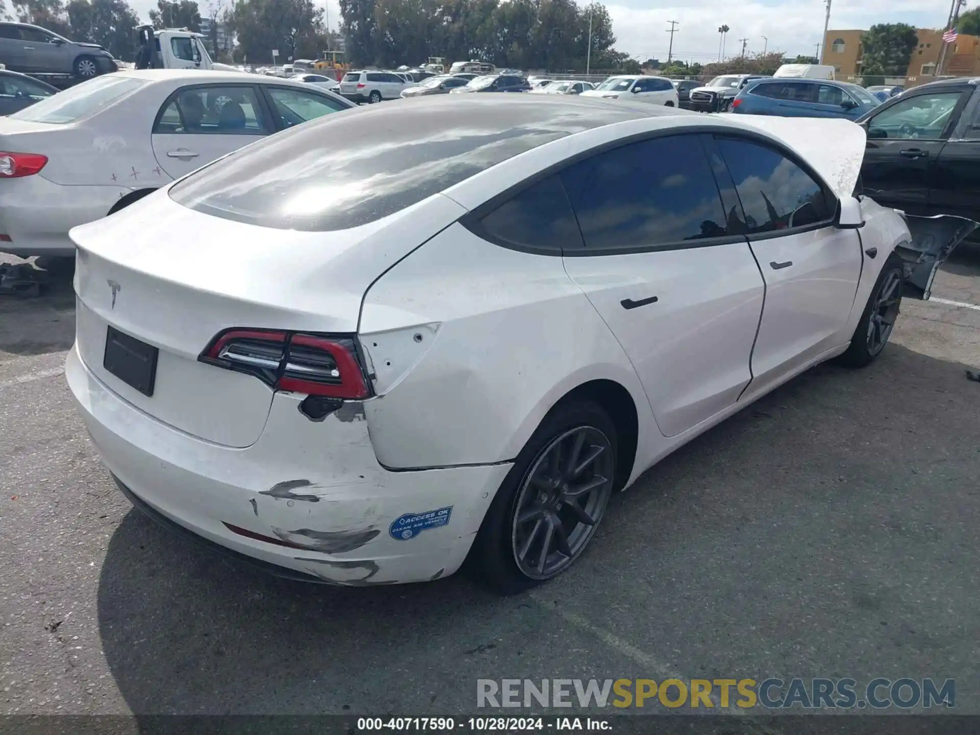 4 Photograph of a damaged car 5YJ3E1EA0MF940540 TESLA MODEL 3 2021