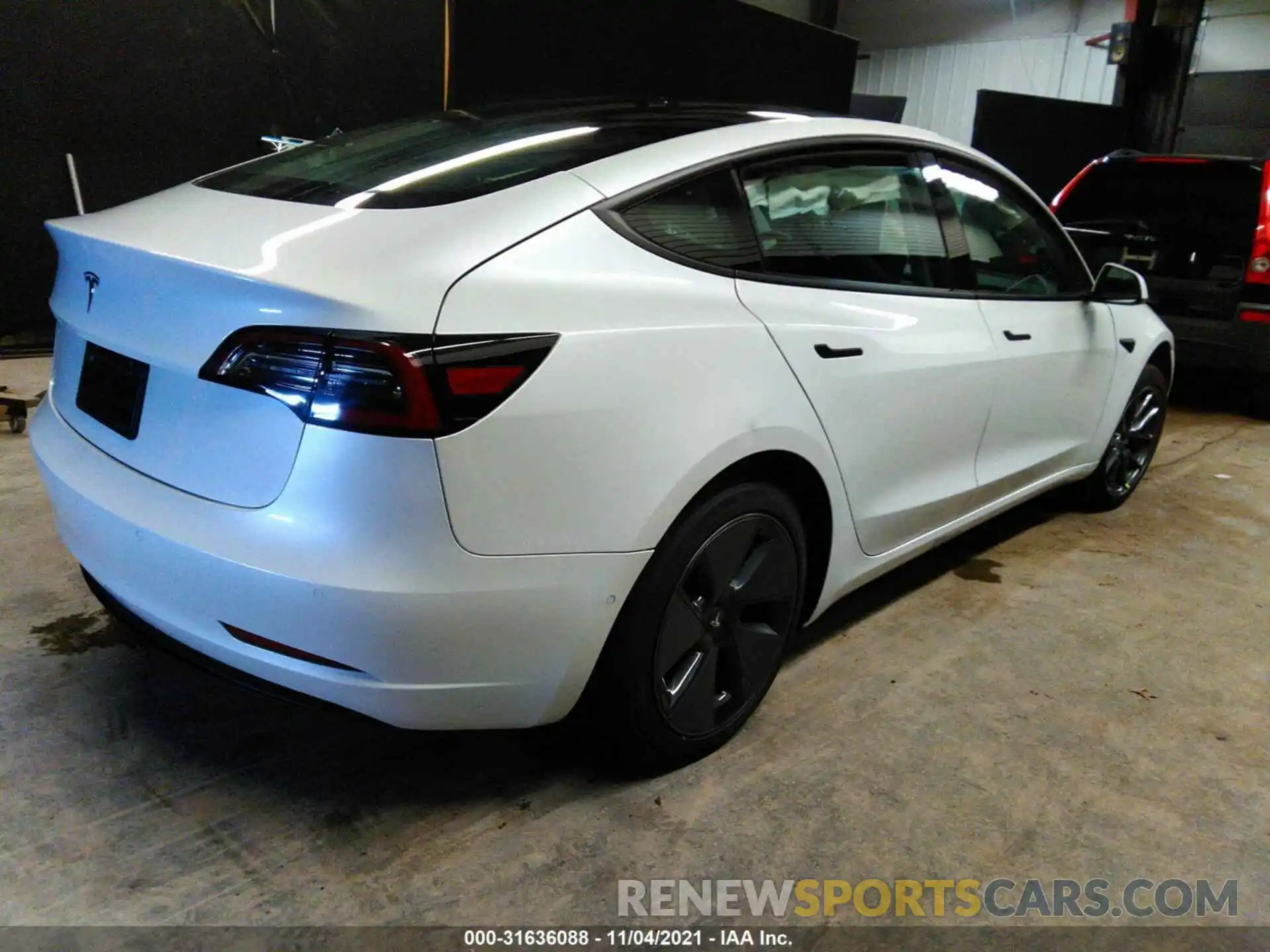 4 Photograph of a damaged car 5YJ3E1EA0MF961193 TESLA MODEL 3 2021