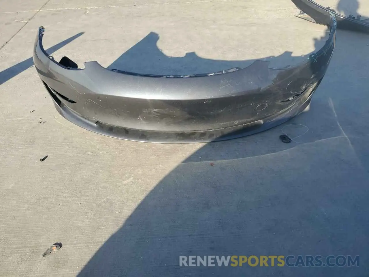 12 Photograph of a damaged car 5YJ3E1EA0MF976700 TESLA MODEL 3 2021