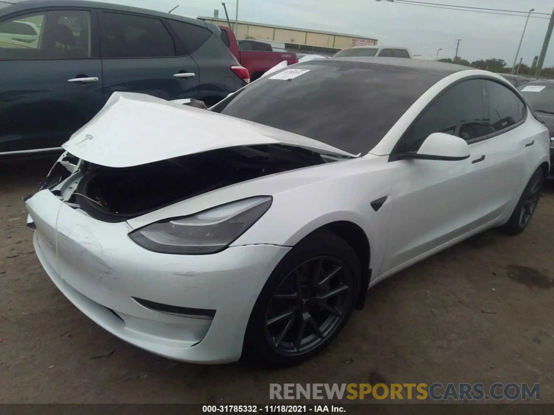 2 Photograph of a damaged car 5YJ3E1EA0MF991746 TESLA MODEL 3 2021