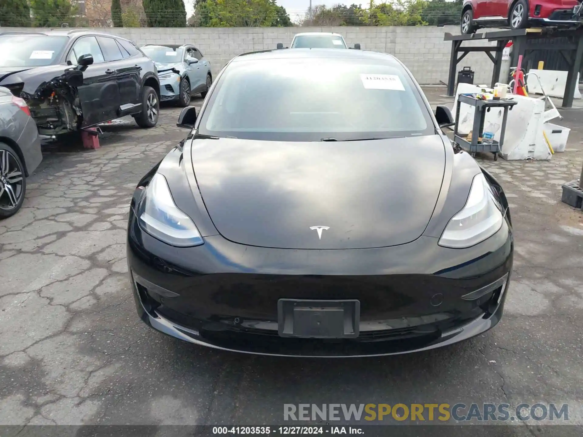 12 Photograph of a damaged car 5YJ3E1EA0MF997305 TESLA MODEL 3 2021