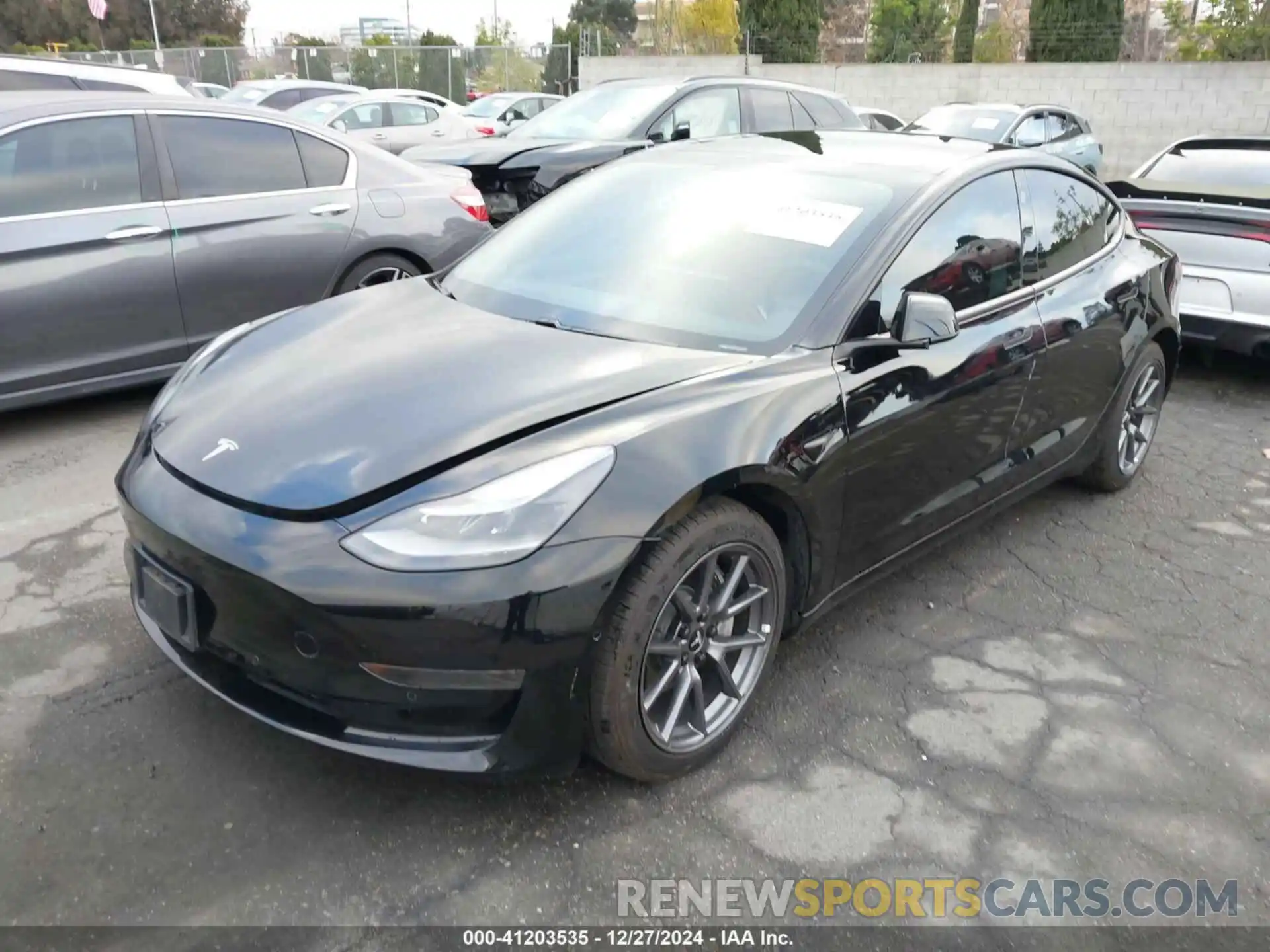 2 Photograph of a damaged car 5YJ3E1EA0MF997305 TESLA MODEL 3 2021