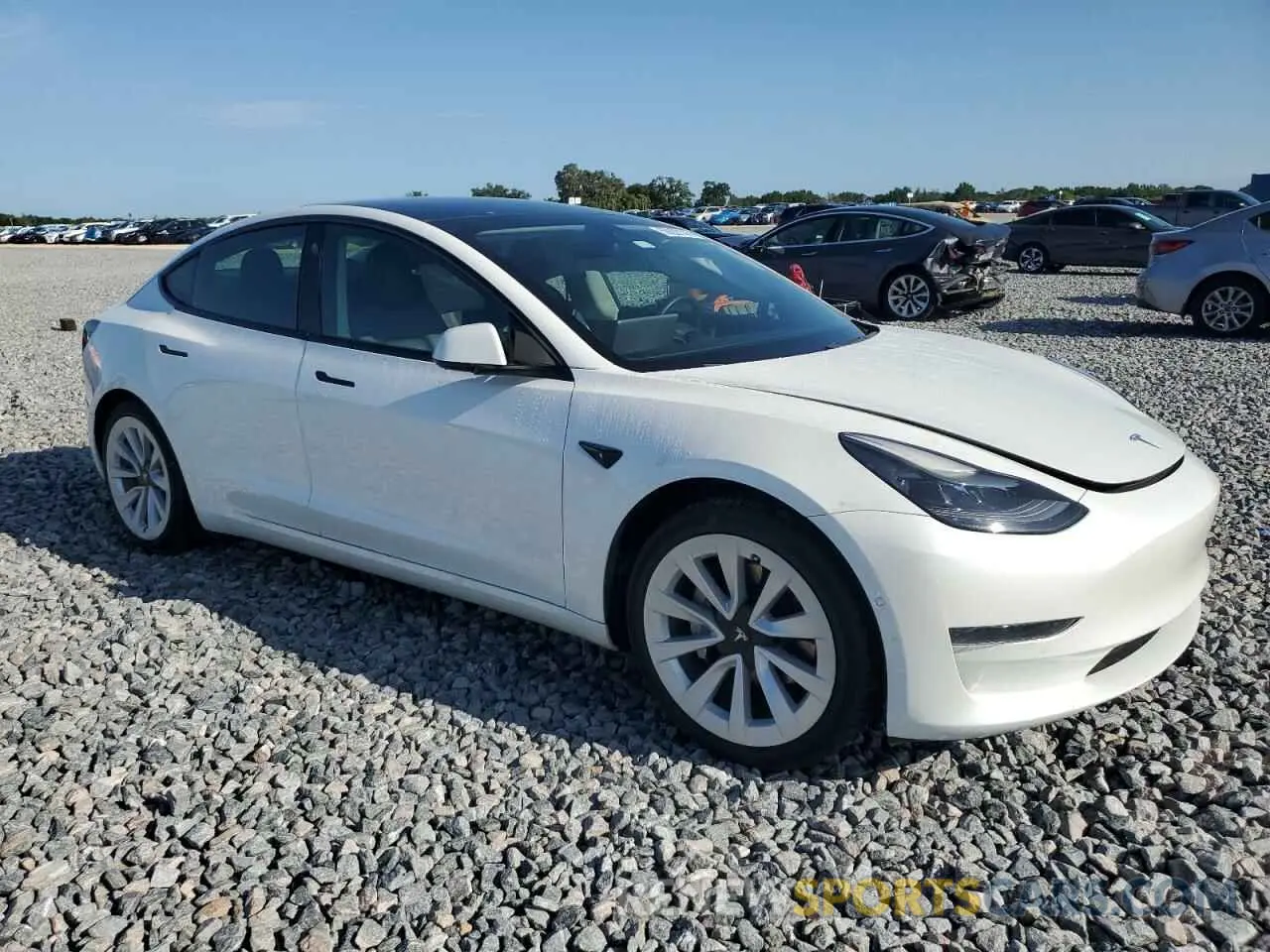 4 Photograph of a damaged car 5YJ3E1EA1MF047177 TESLA MODEL 3 2021
