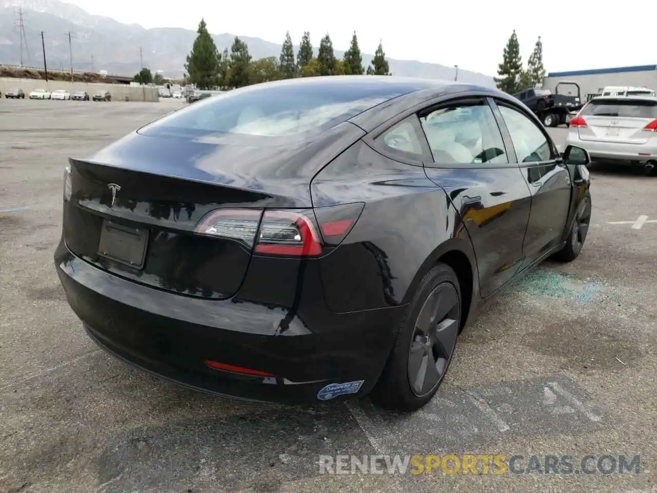 4 Photograph of a damaged car 5YJ3E1EA1MF064559 TESLA MODEL 3 2021