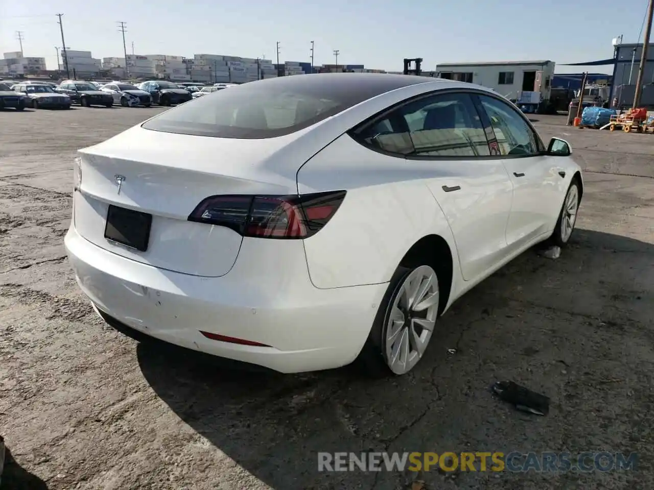 4 Photograph of a damaged car 5YJ3E1EA1MF066554 TESLA MODEL 3 2021