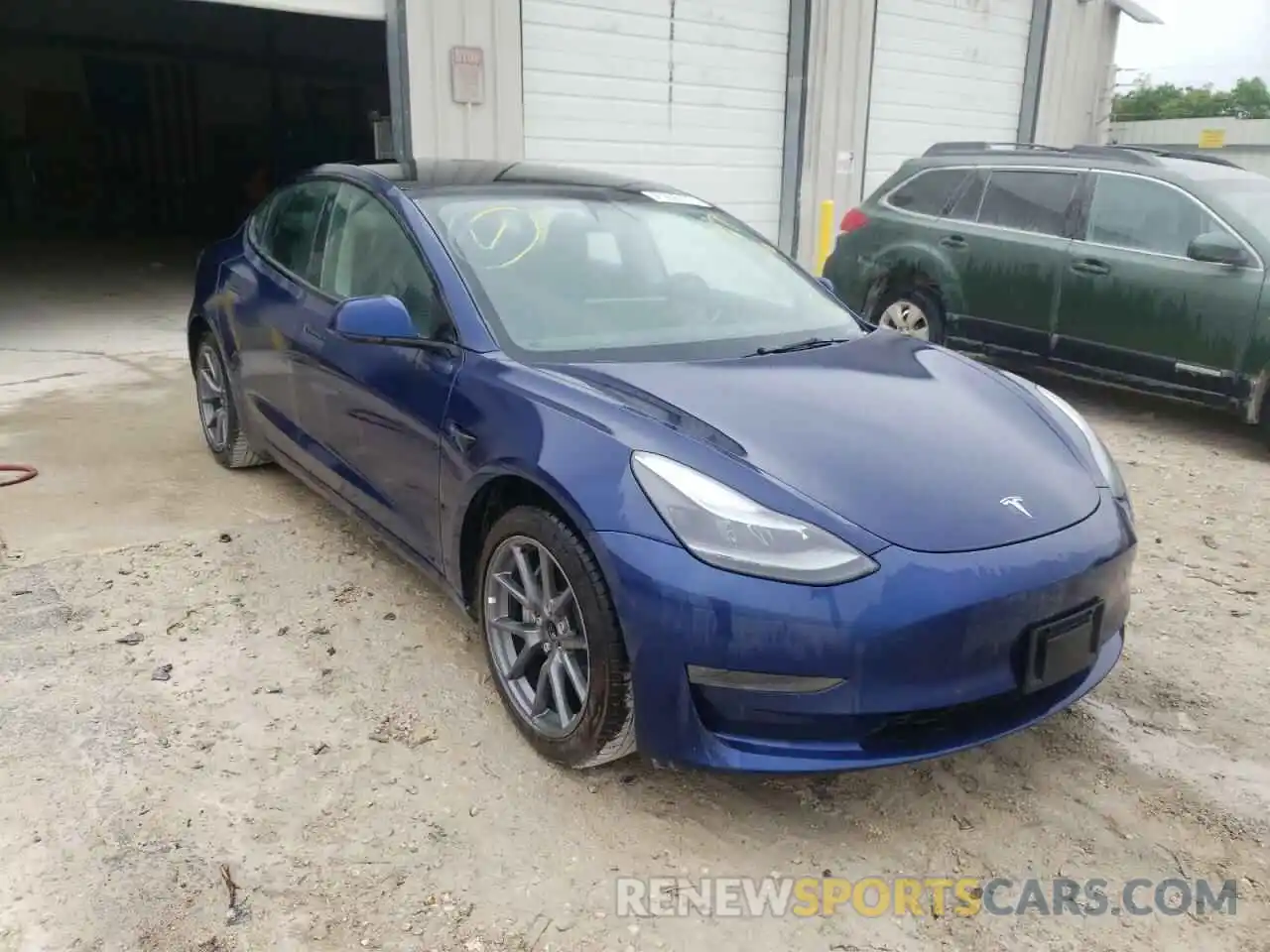 1 Photograph of a damaged car 5YJ3E1EA1MF087176 TESLA MODEL 3 2021