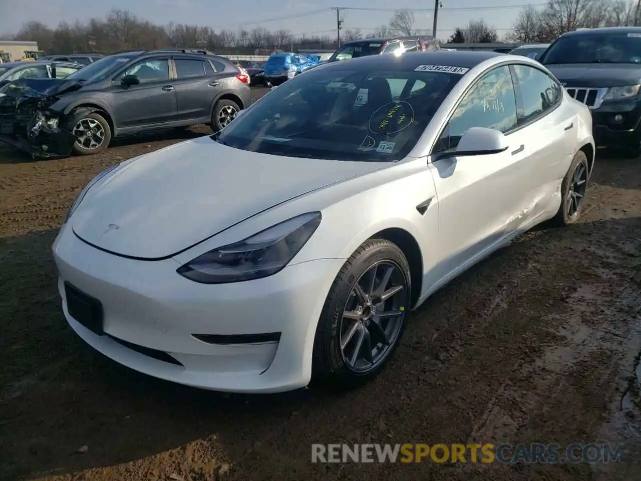 2 Photograph of a damaged car 5YJ3E1EA1MF087498 TESLA MODEL 3 2021