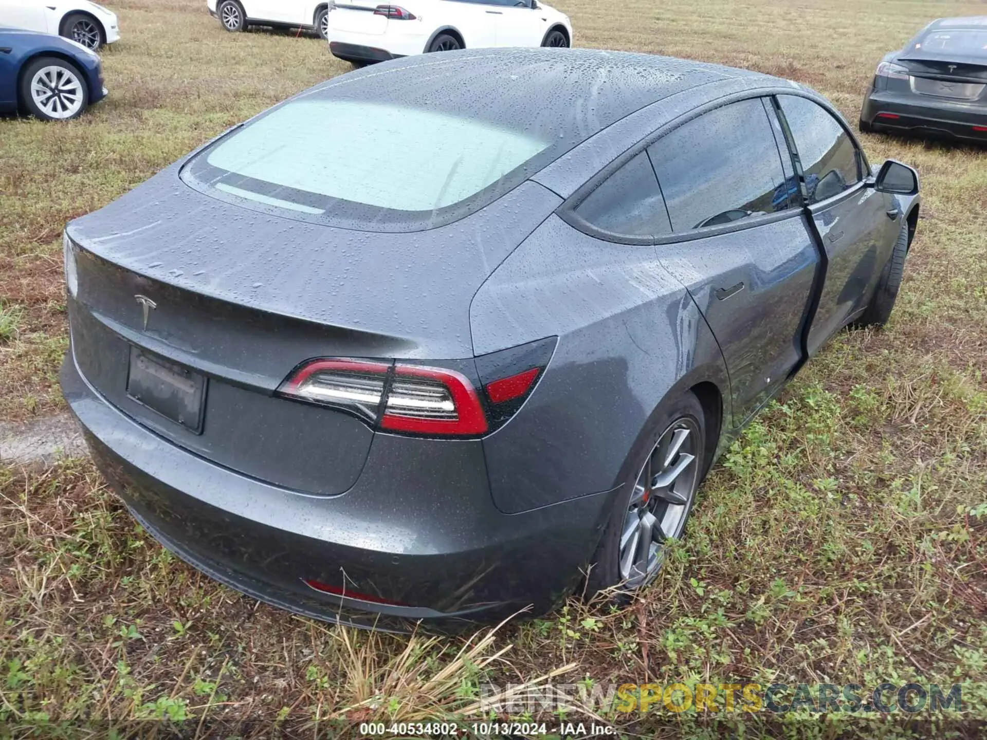 4 Photograph of a damaged car 5YJ3E1EA1MF854542 TESLA MODEL 3 2021