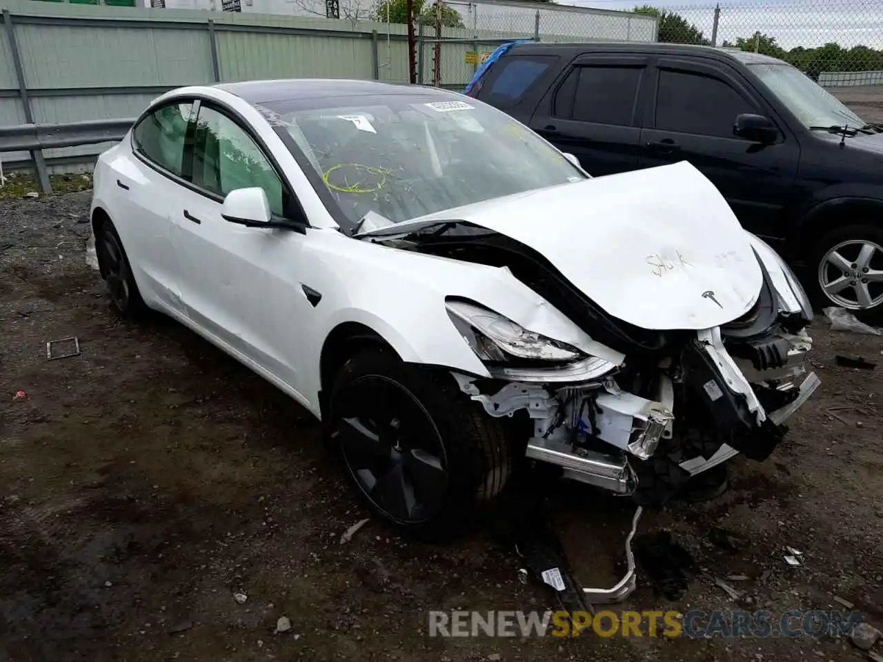 1 Photograph of a damaged car 5YJ3E1EA1MF859952 TESLA MODEL 3 2021