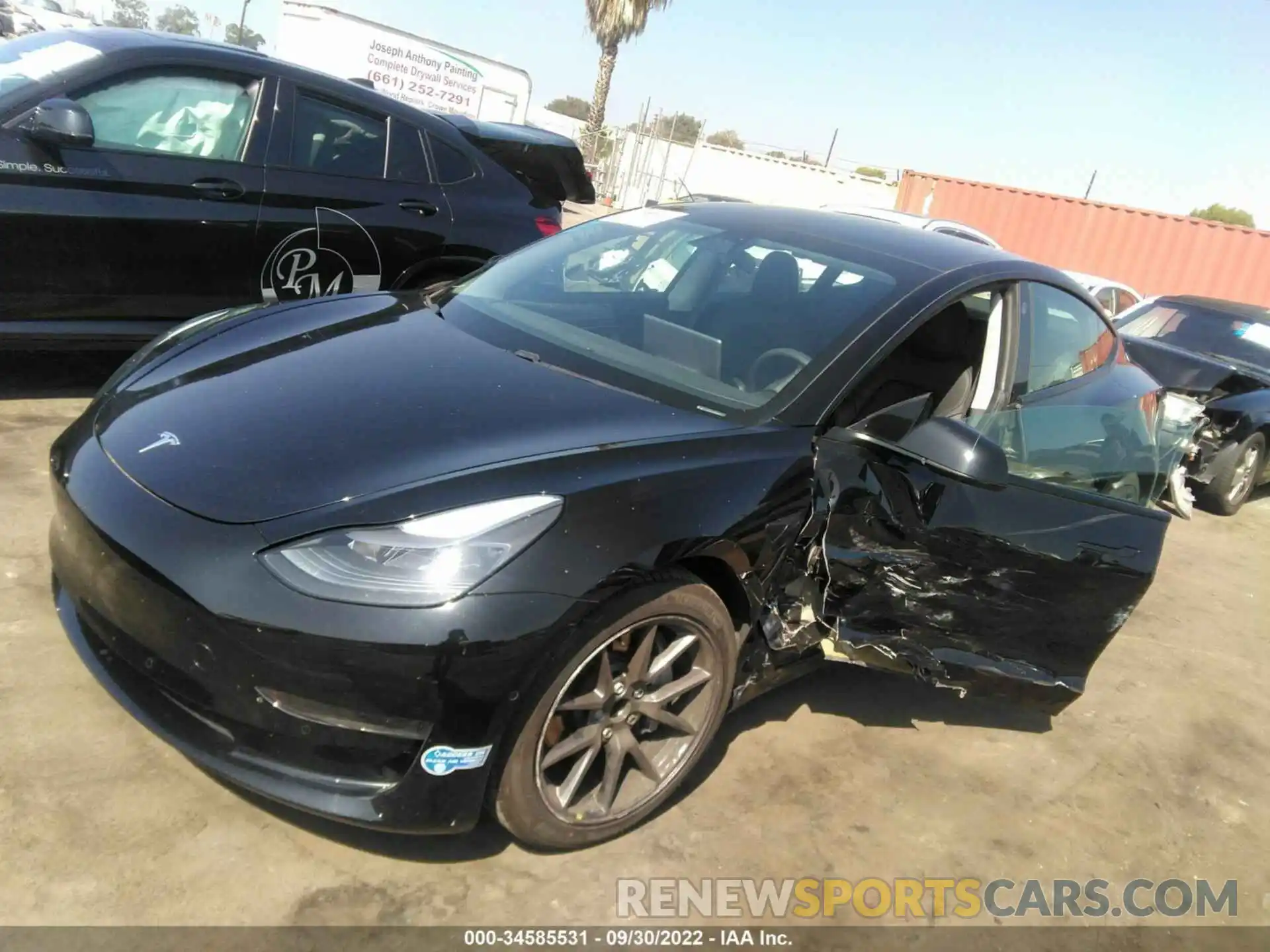 2 Photograph of a damaged car 5YJ3E1EA1MF875486 TESLA MODEL 3 2021