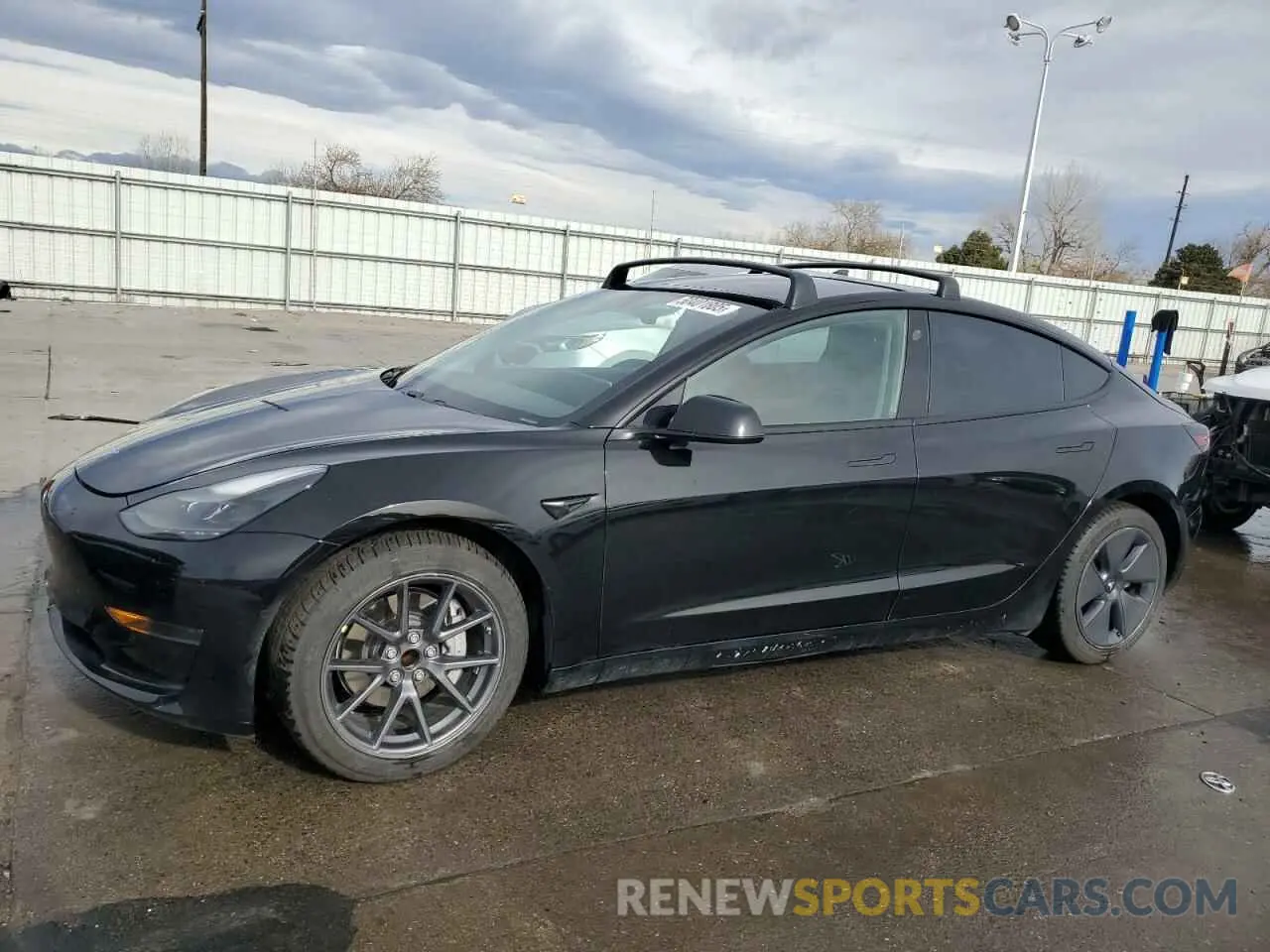 1 Photograph of a damaged car 5YJ3E1EA1MF876427 TESLA MODEL 3 2021
