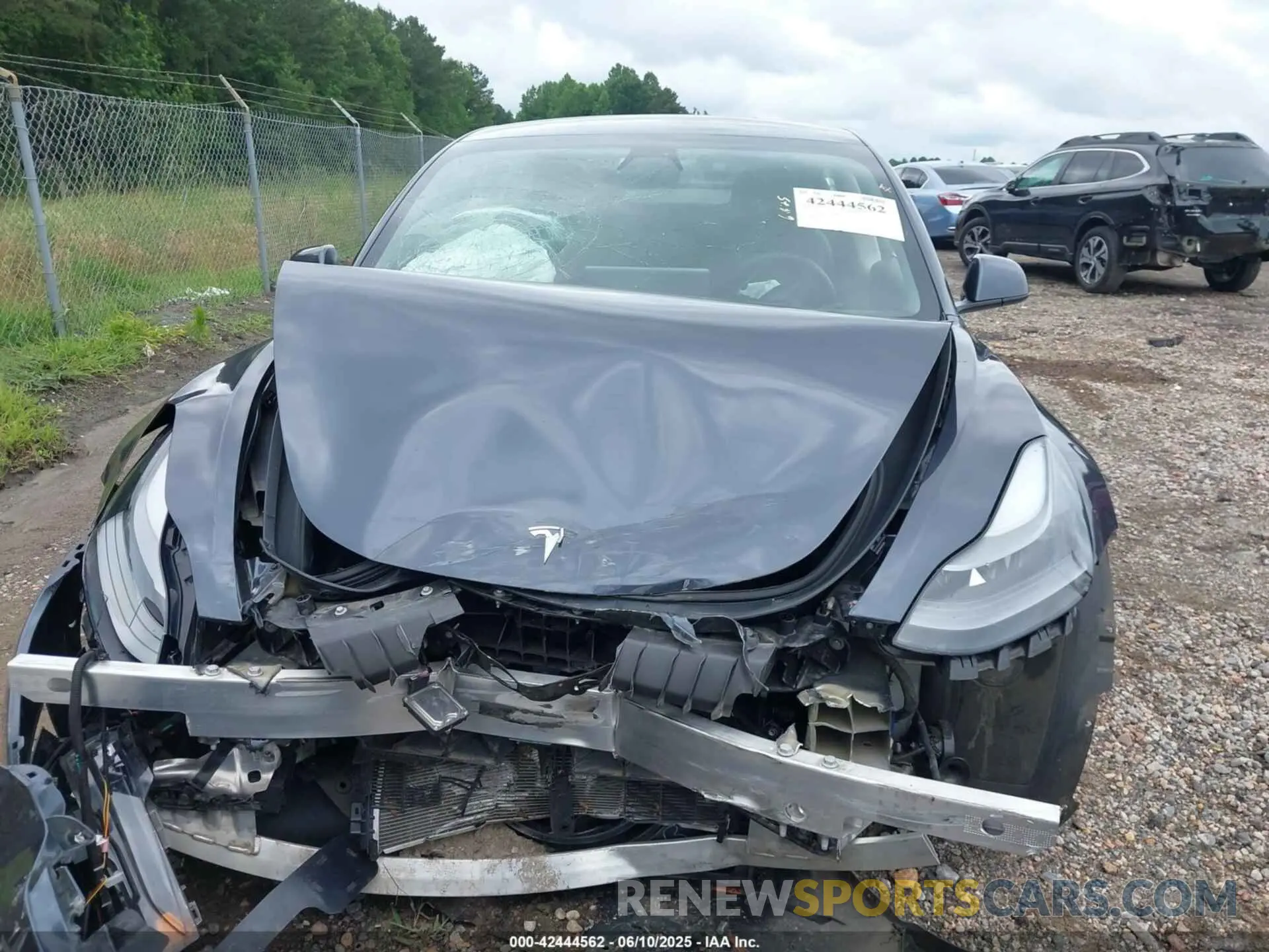 12 Photograph of a damaged car 5YJ3E1EA1MF911192 TESLA MODEL 3 2021