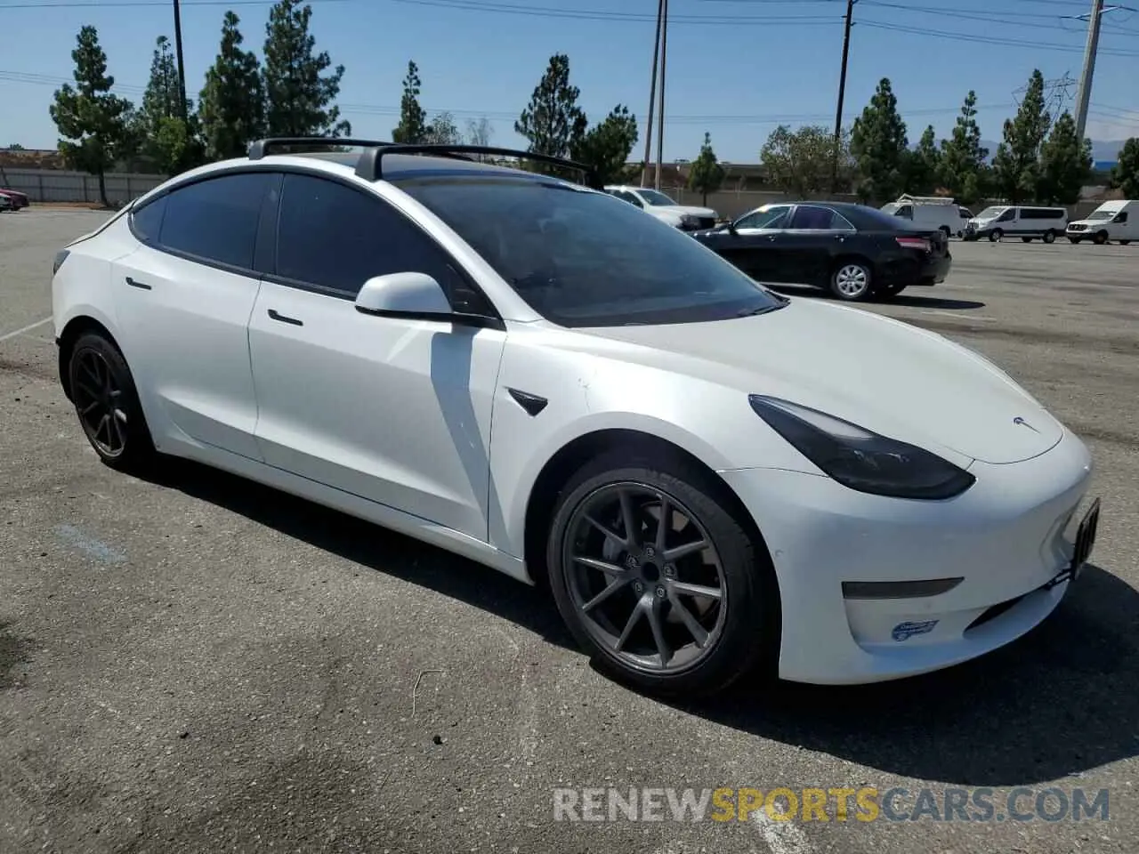 4 Photograph of a damaged car 5YJ3E1EA1MF941440 TESLA MODEL 3 2021