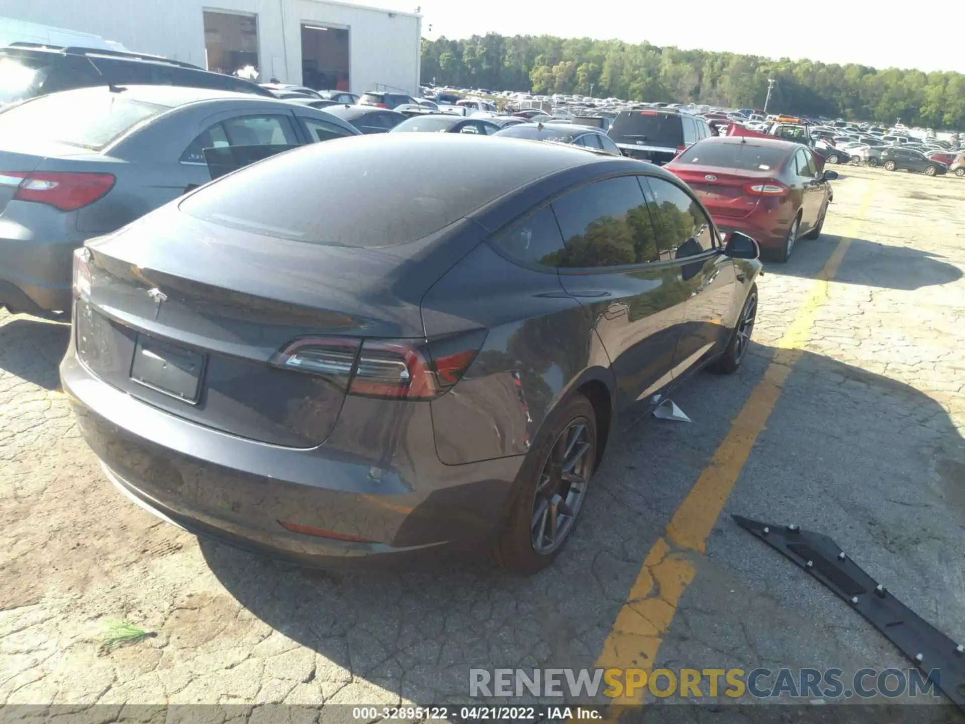 4 Photograph of a damaged car 5YJ3E1EA1MF963289 TESLA MODEL 3 2021