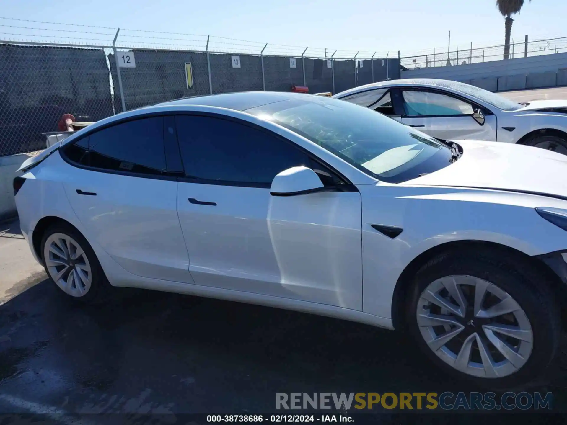 14 Photograph of a damaged car 5YJ3E1EA1MF978102 TESLA MODEL 3 2021